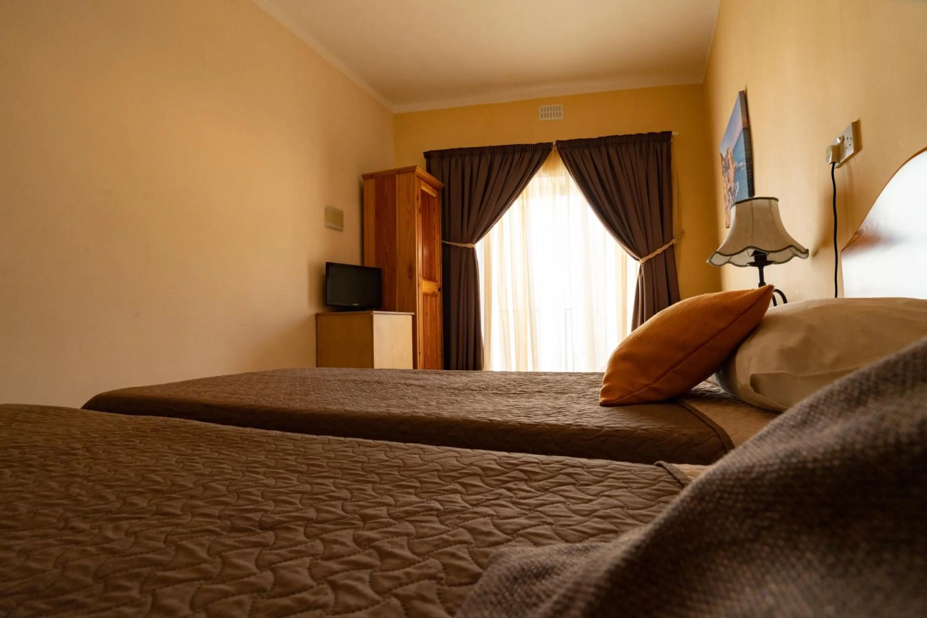 Bed in Lantern Guest House