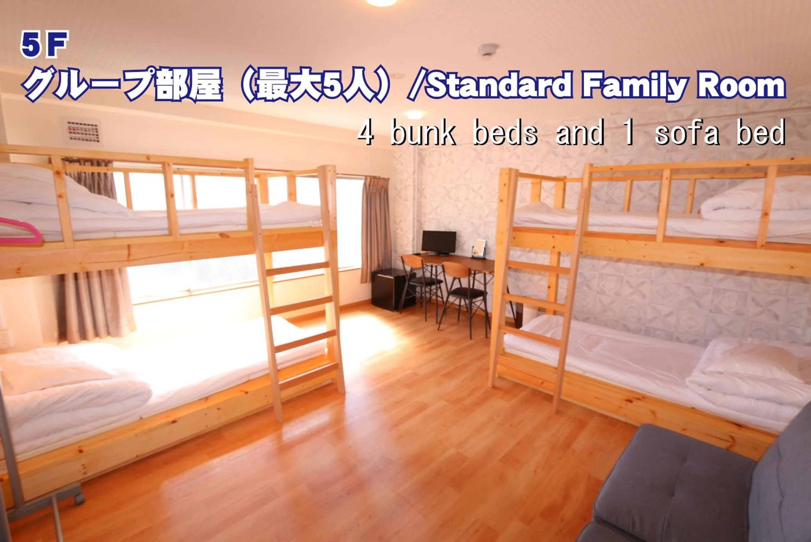 Photo of the whole room, Bed in RED HELMET House & Sports Bar Hiroshima