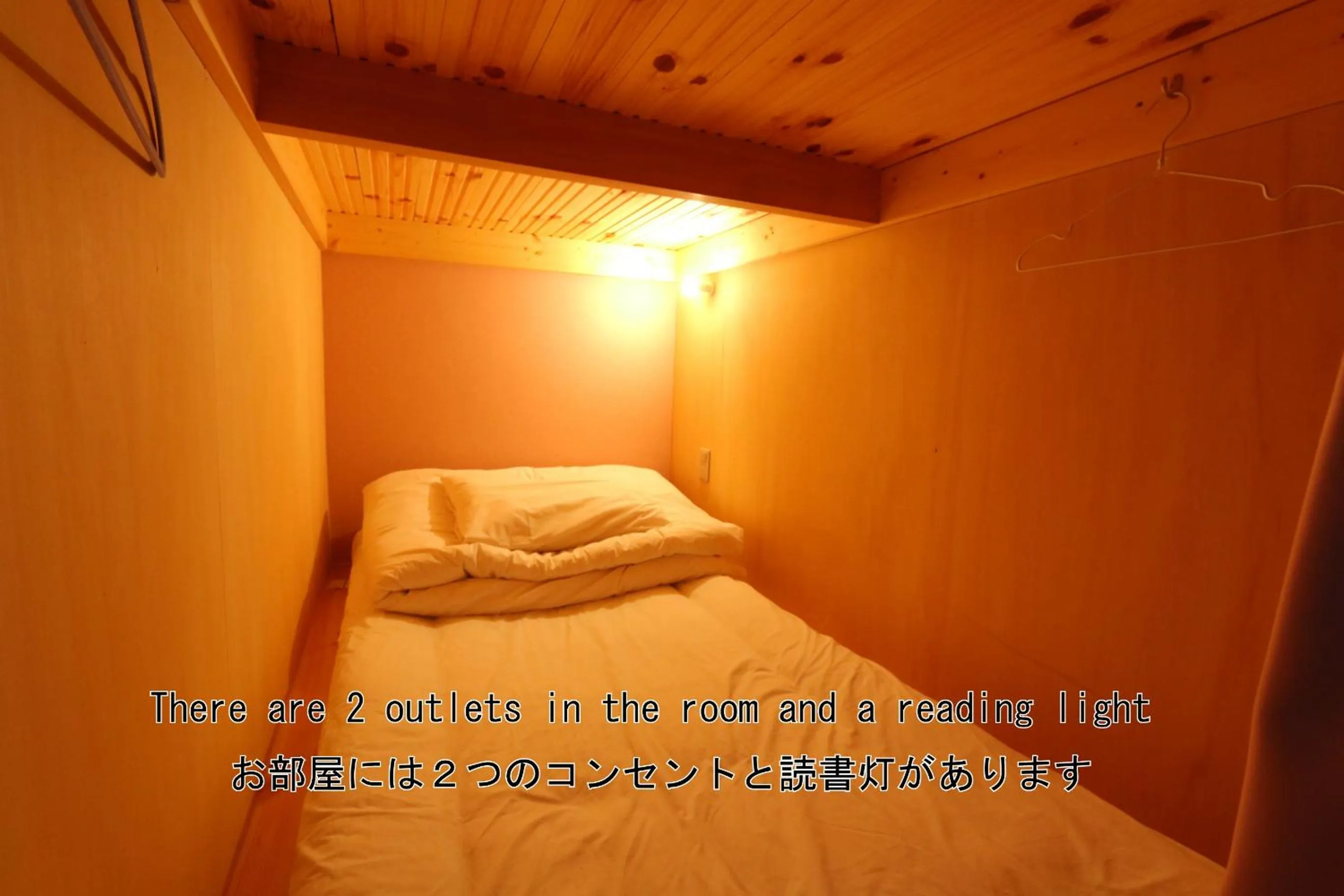 Photo of the whole room, Bed in RED HELMET House & Sports Bar Hiroshima