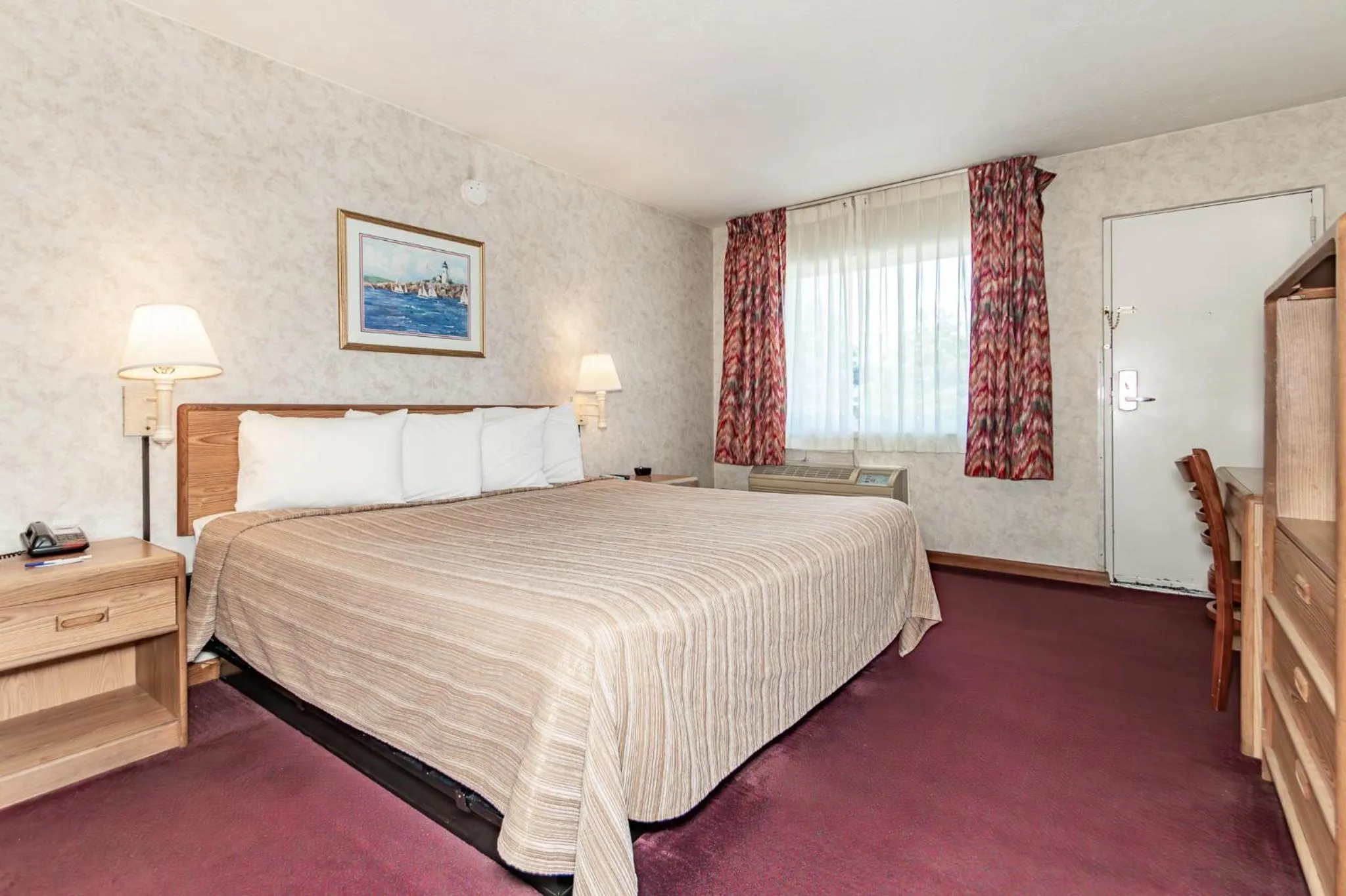 Bed in Americas Best Value Inn Ashtabula/Austinburg