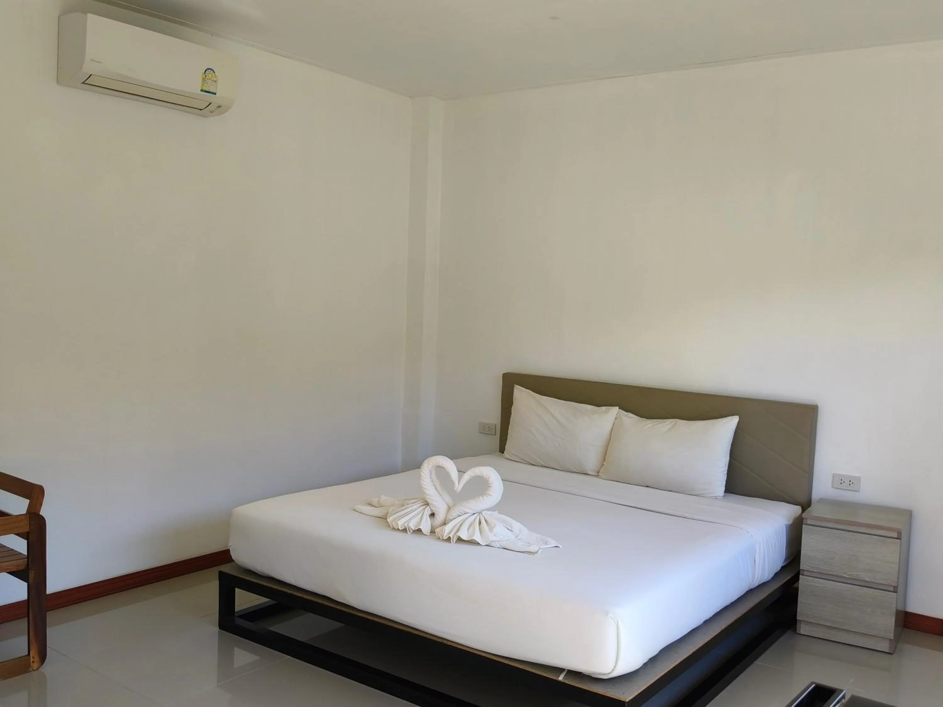 Bed in The Lodge at Koh Kood