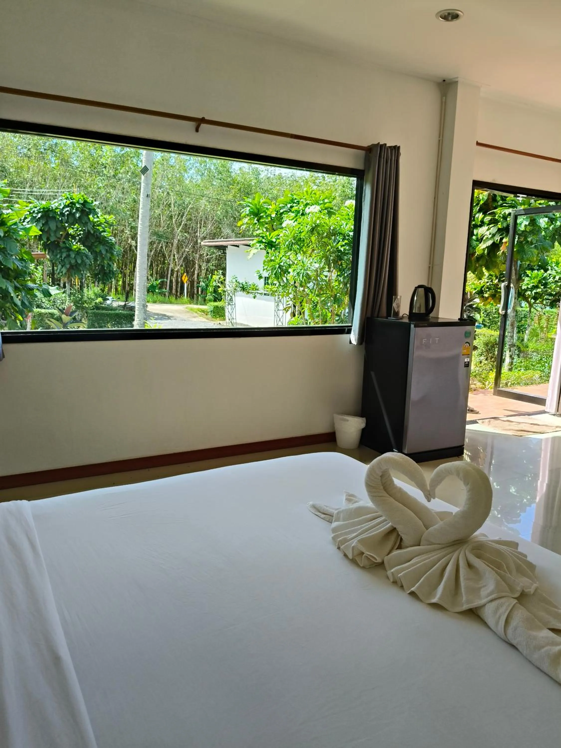Bed in The Lodge at Koh Kood