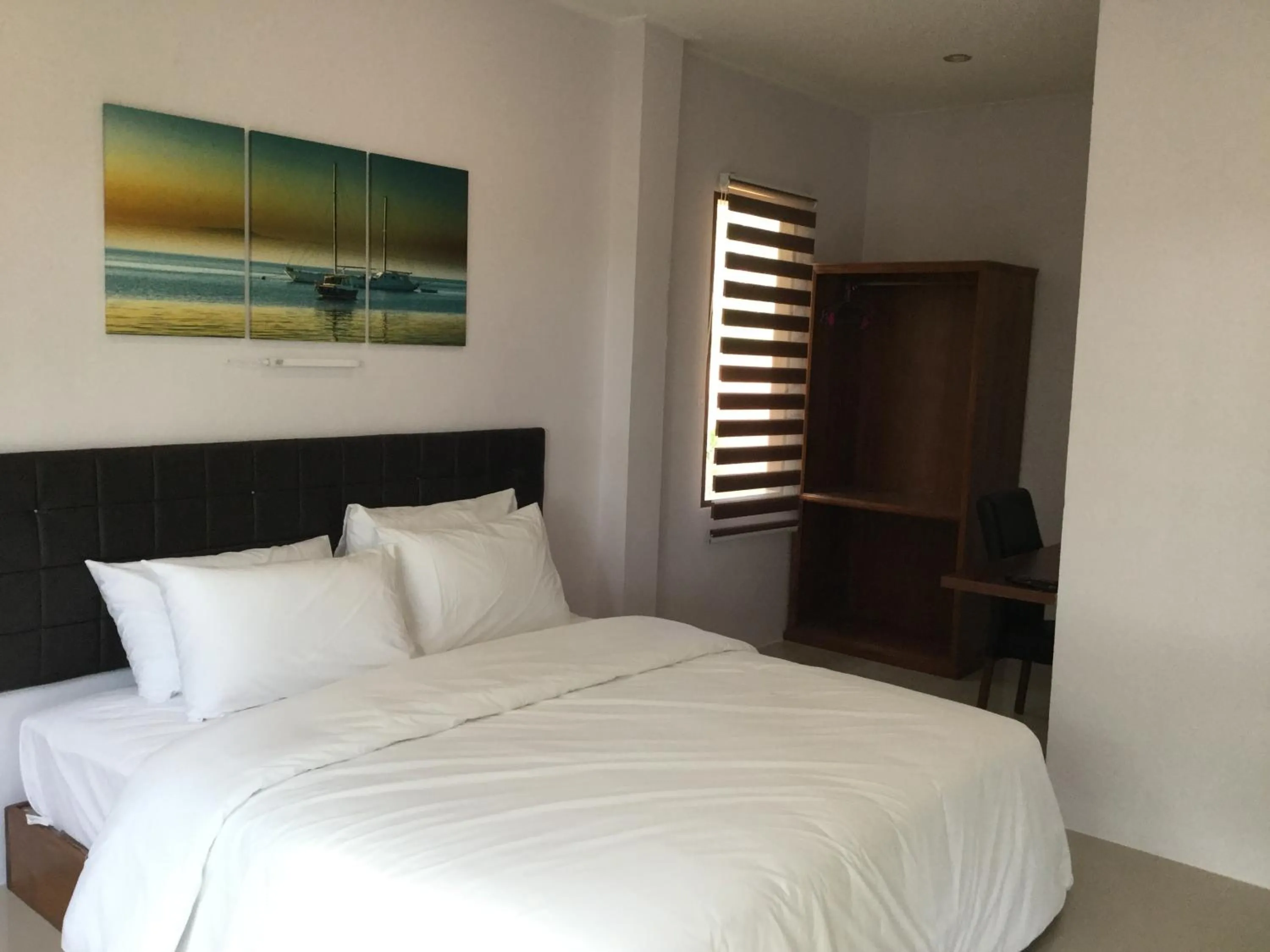 Photo of the whole room, Bed in The Lodge at Koh Kood