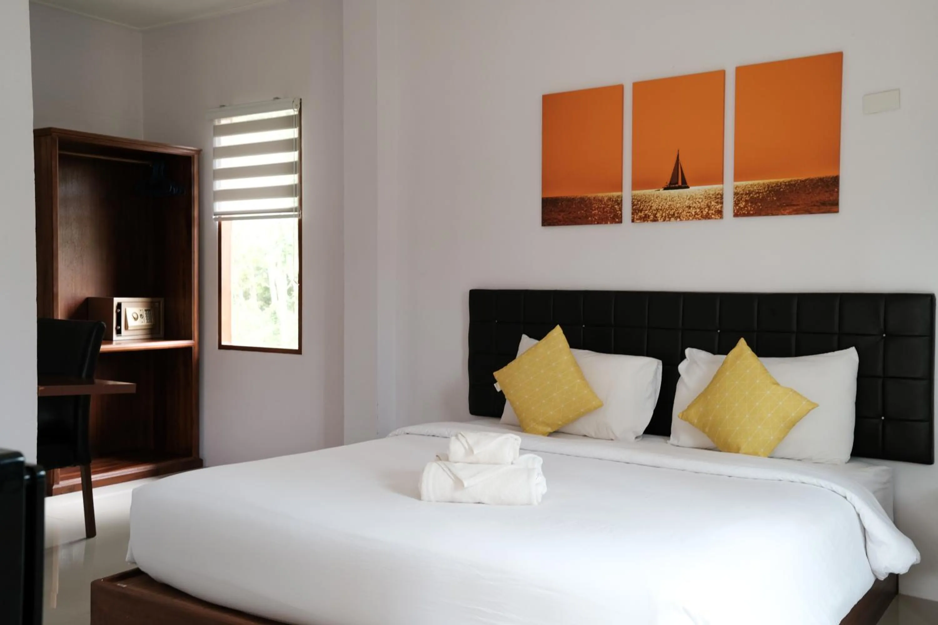 Bed in The Lodge at Koh Kood