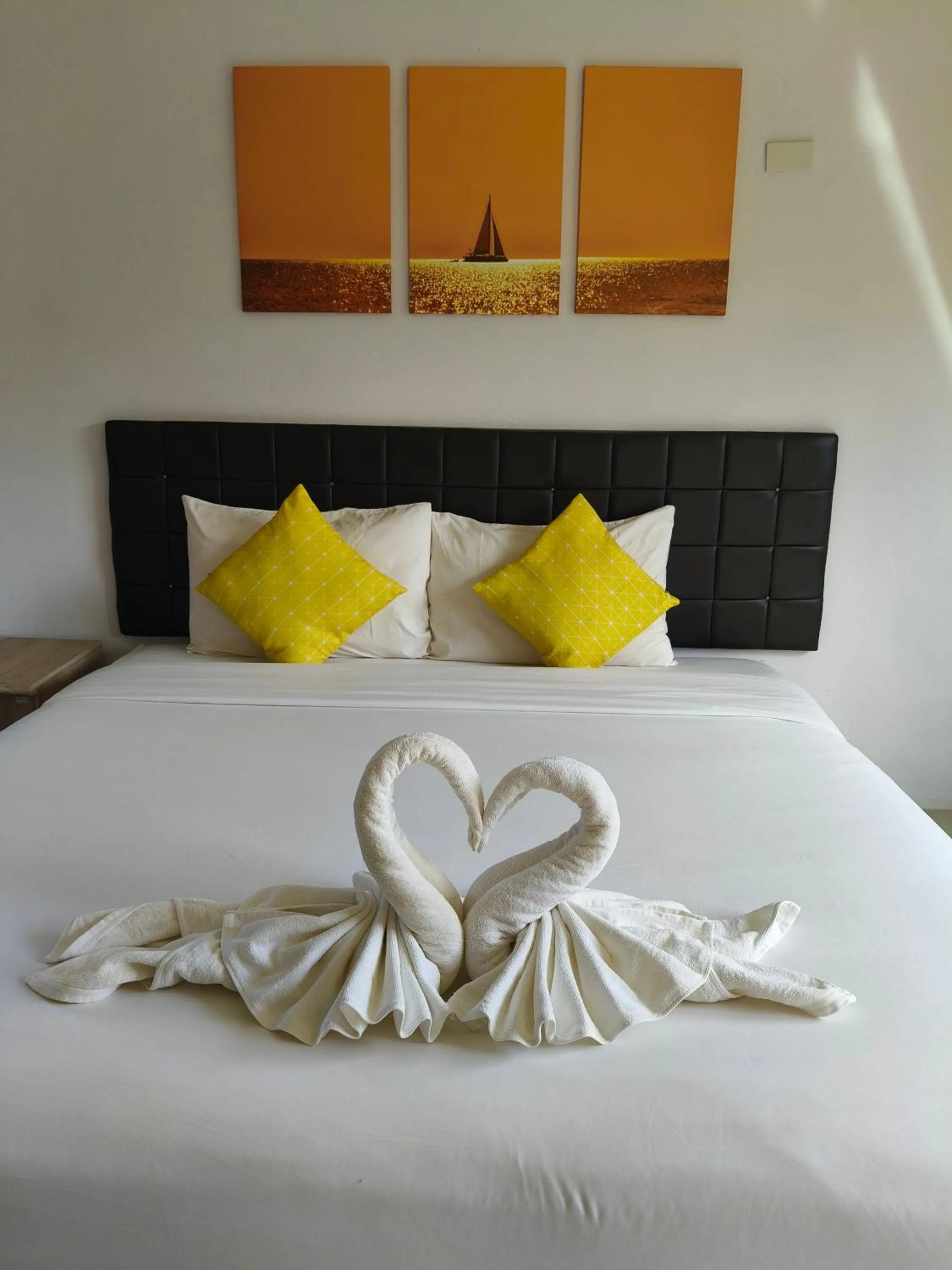 Bed in The Lodge at Koh Kood