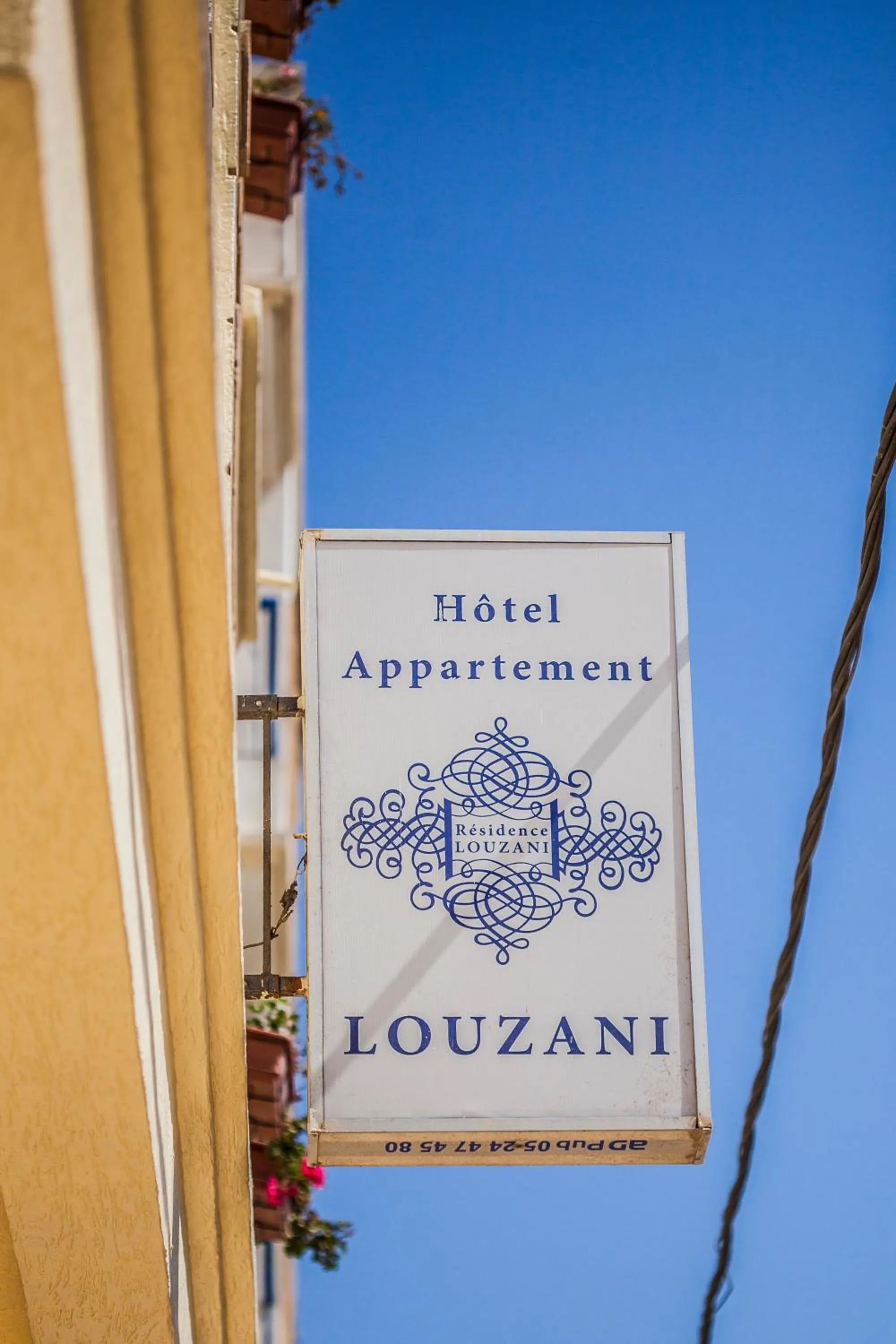 Property logo or sign in Résidence Louzani