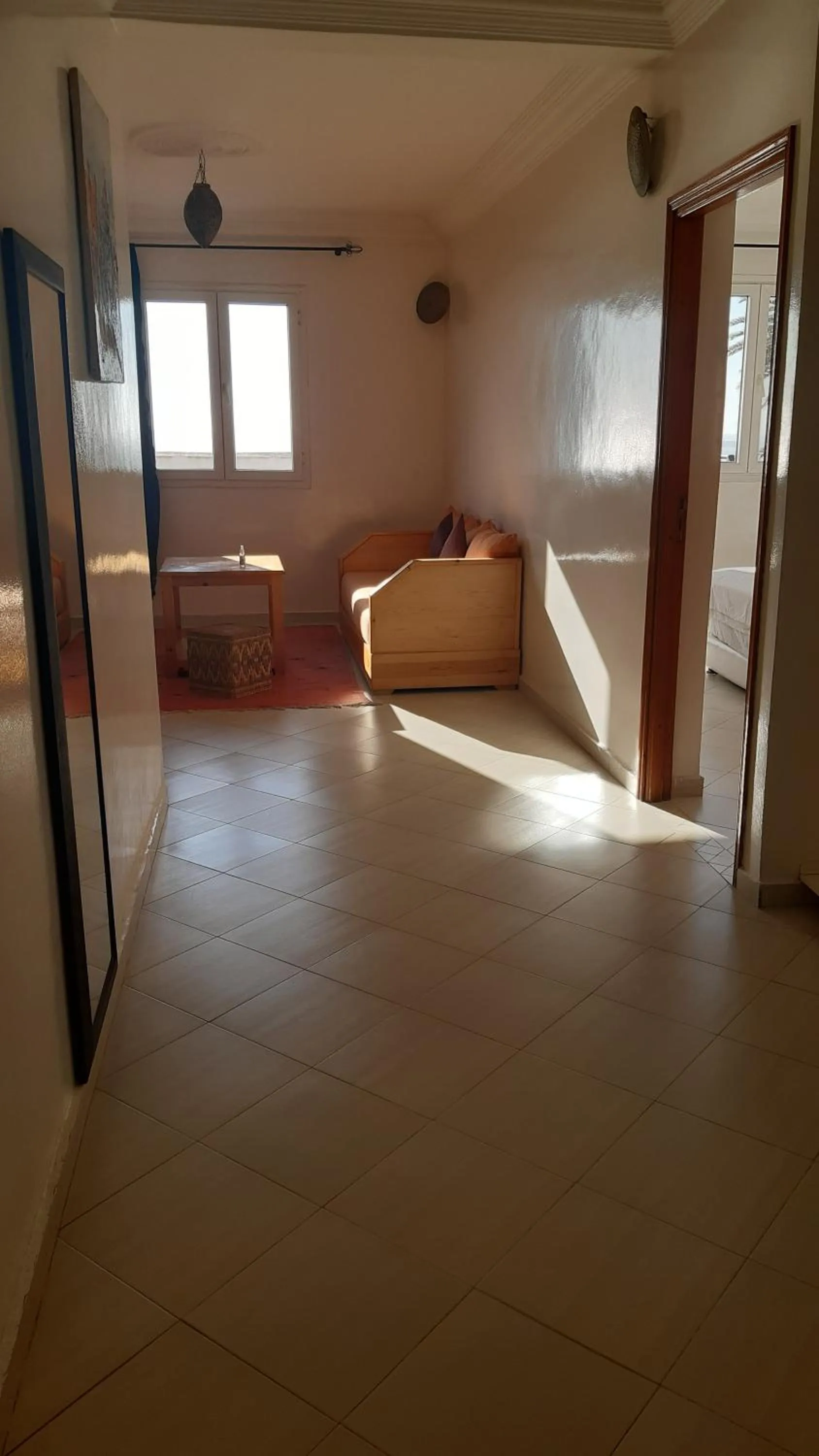 Communal lounge/ TV room, Bed in Résidence Louzani