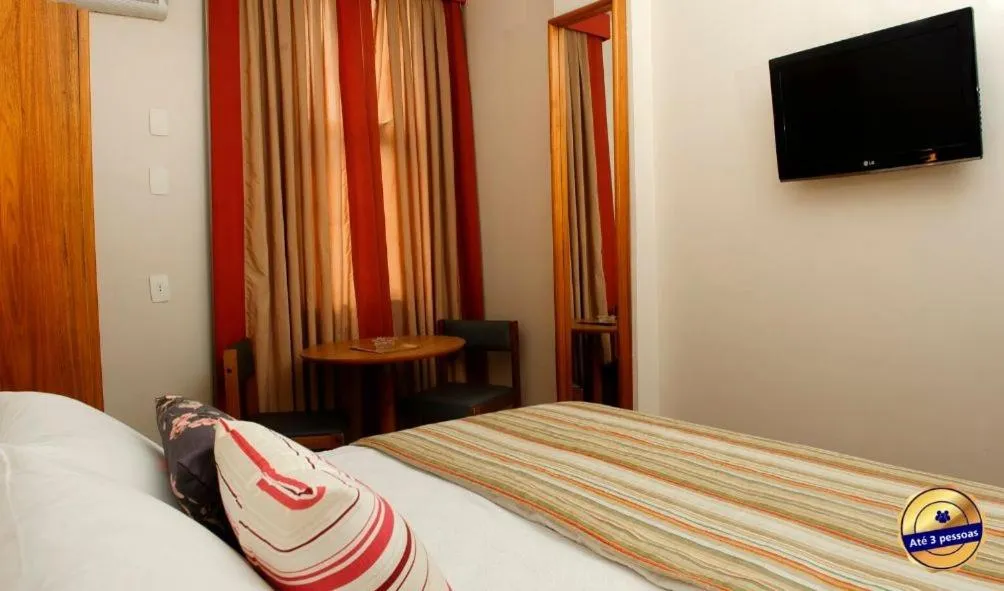 Bed in César Inn Juiz de Fora Hotel