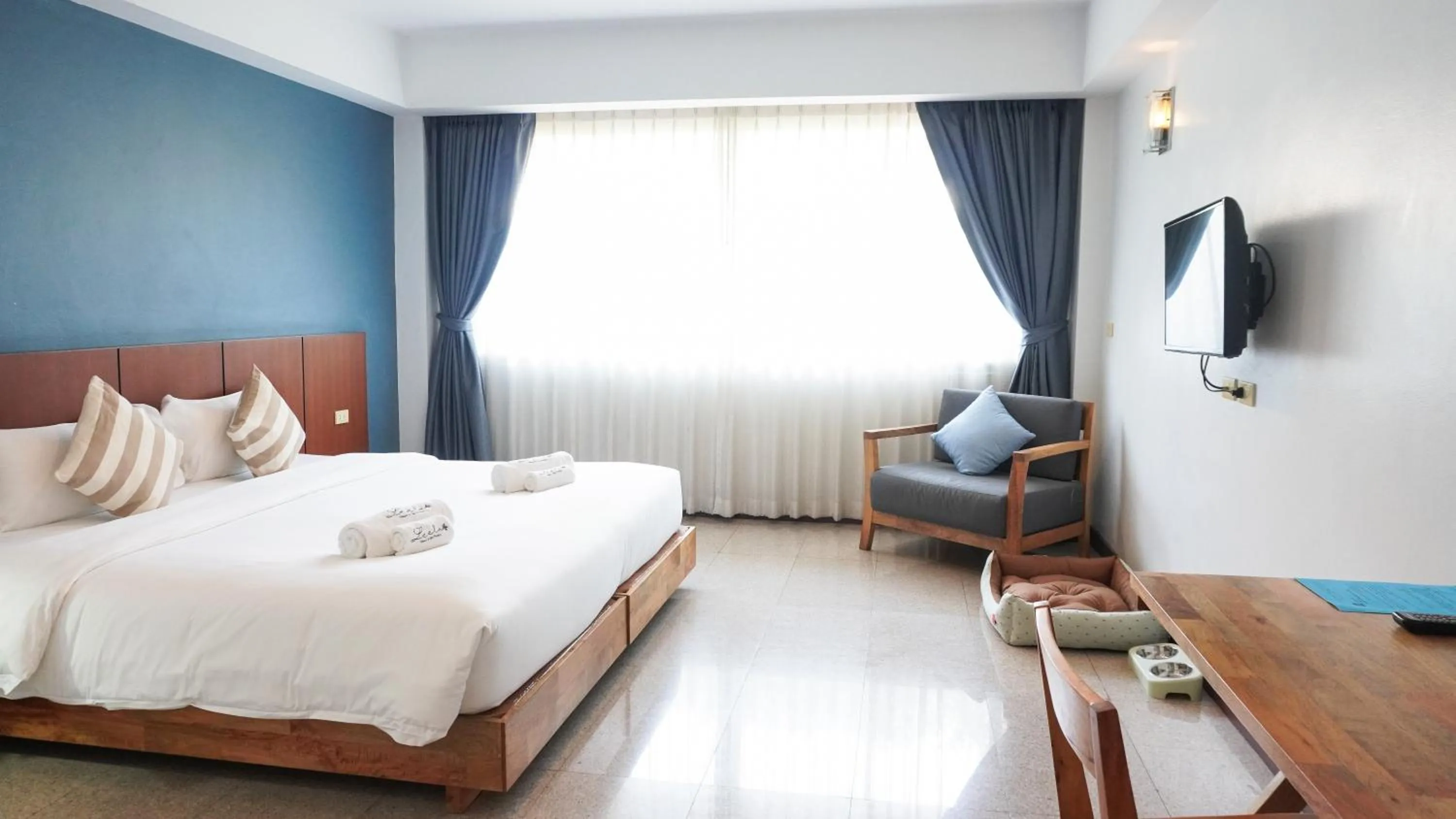 Bed in The Leela Resort & Spa Pattaya