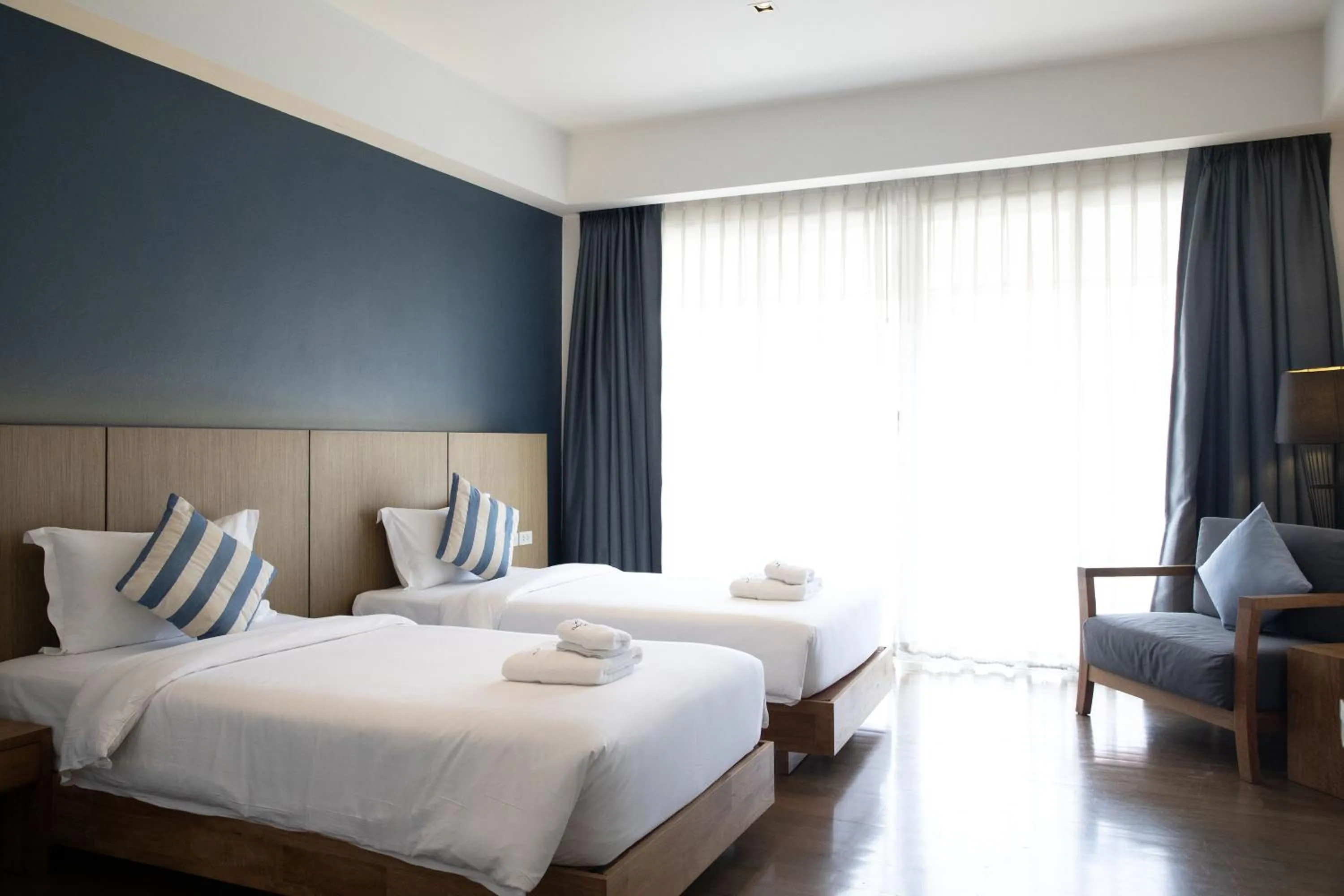 Bed in The Leela Resort & Spa Pattaya