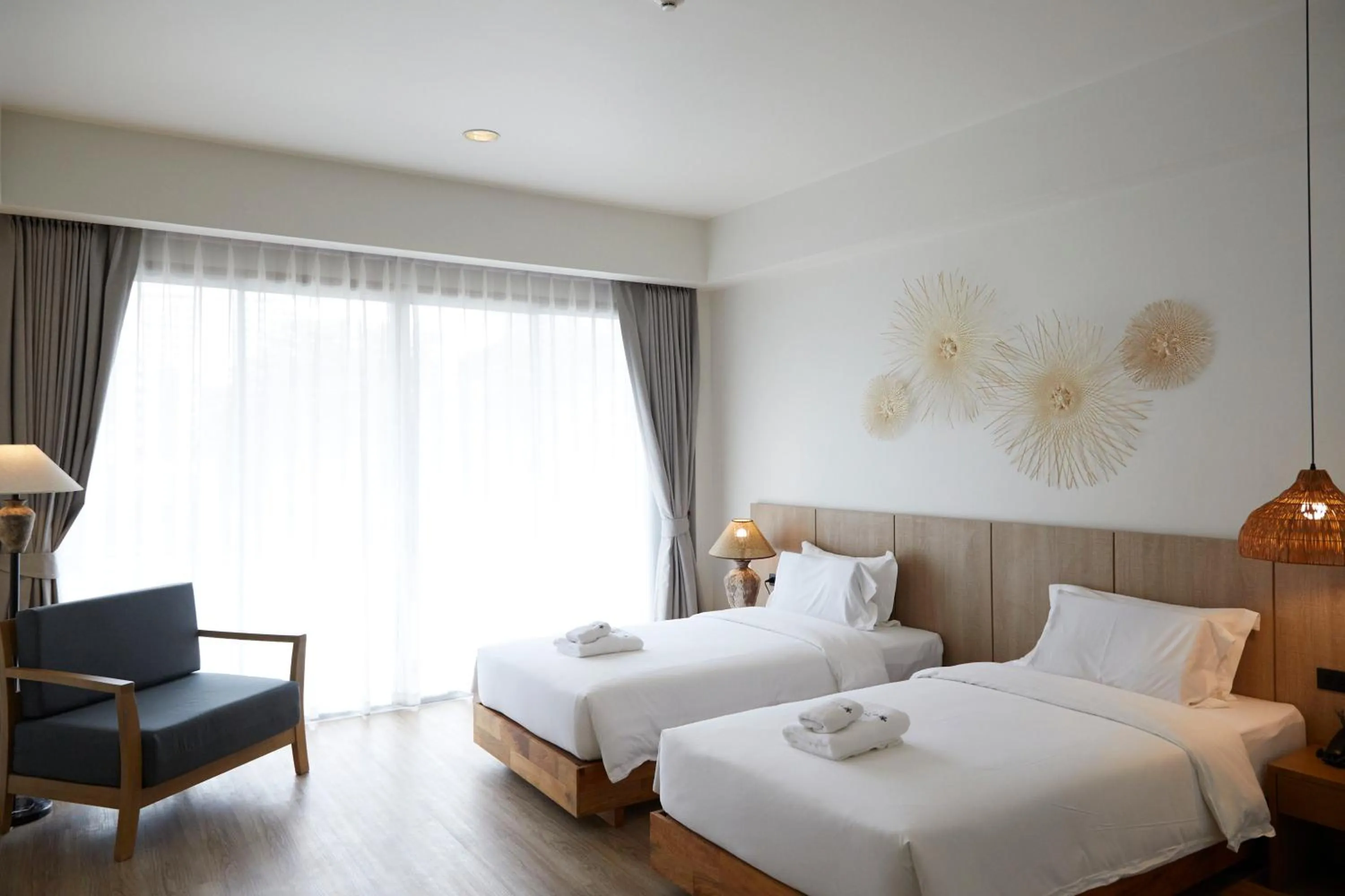 Bed in The Leela Resort & Spa Pattaya