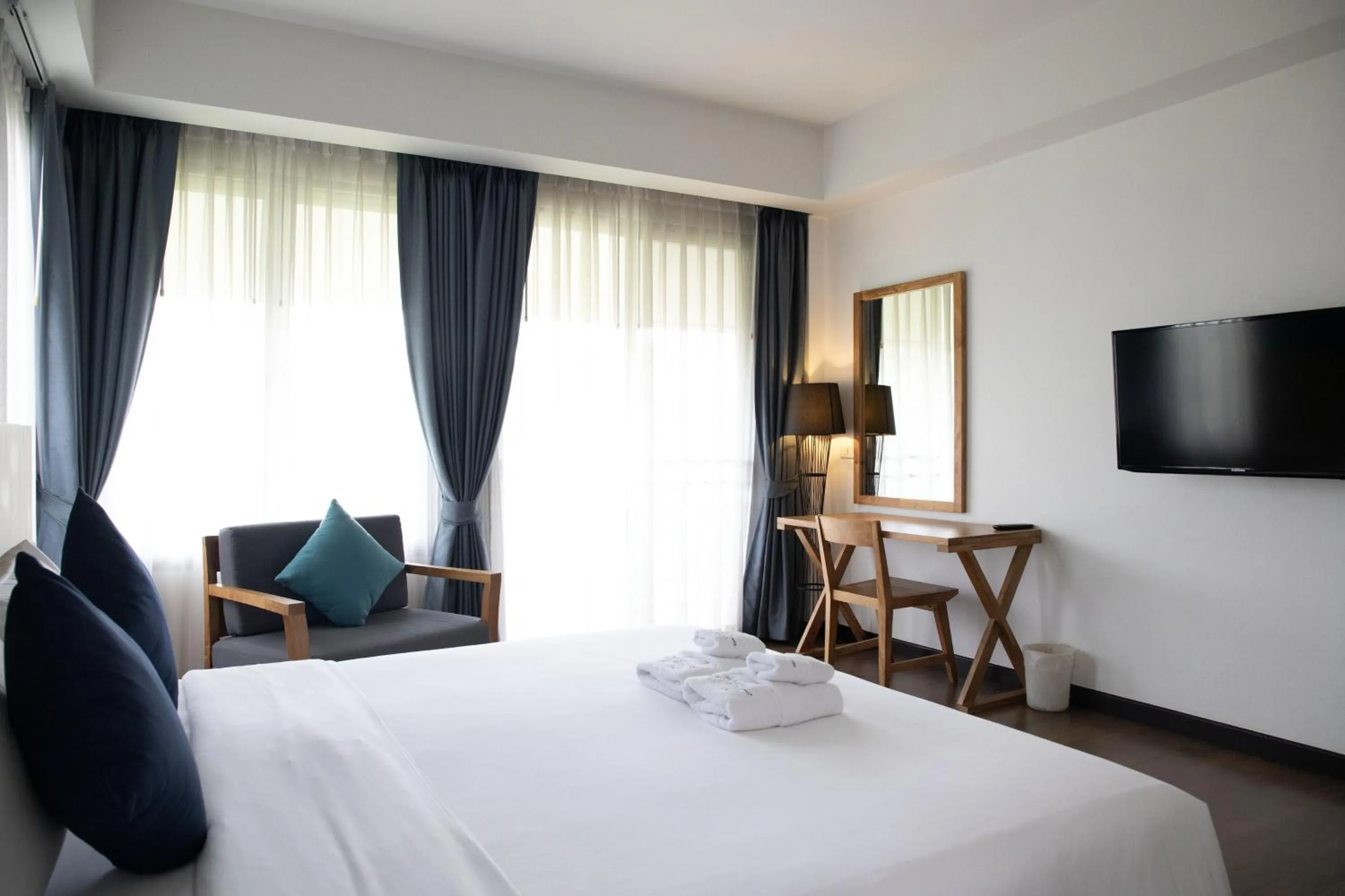 Bed in The Leela Resort & Spa Pattaya