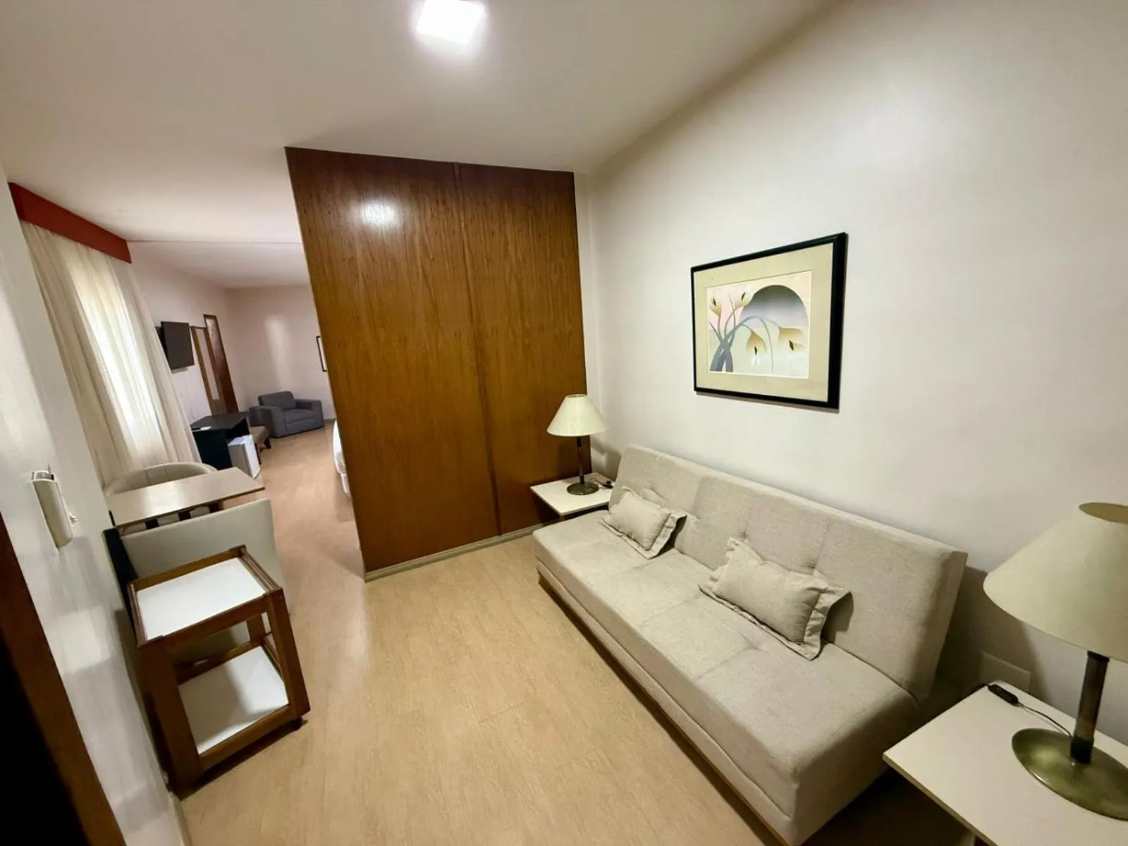 Seating area, Bed in César Park Hotel