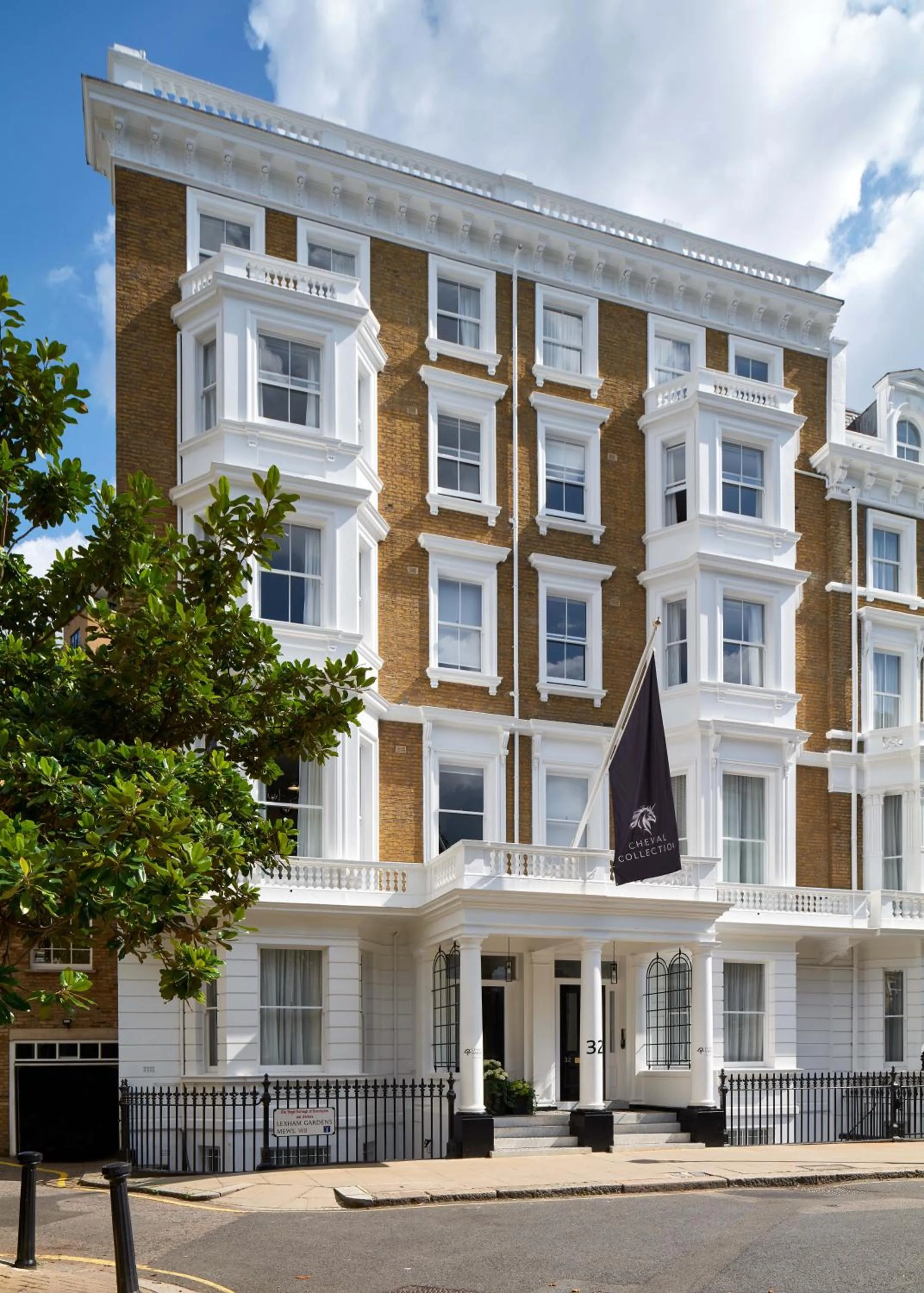 Facade/entrance in Lexham Gardens by Cheval Maison