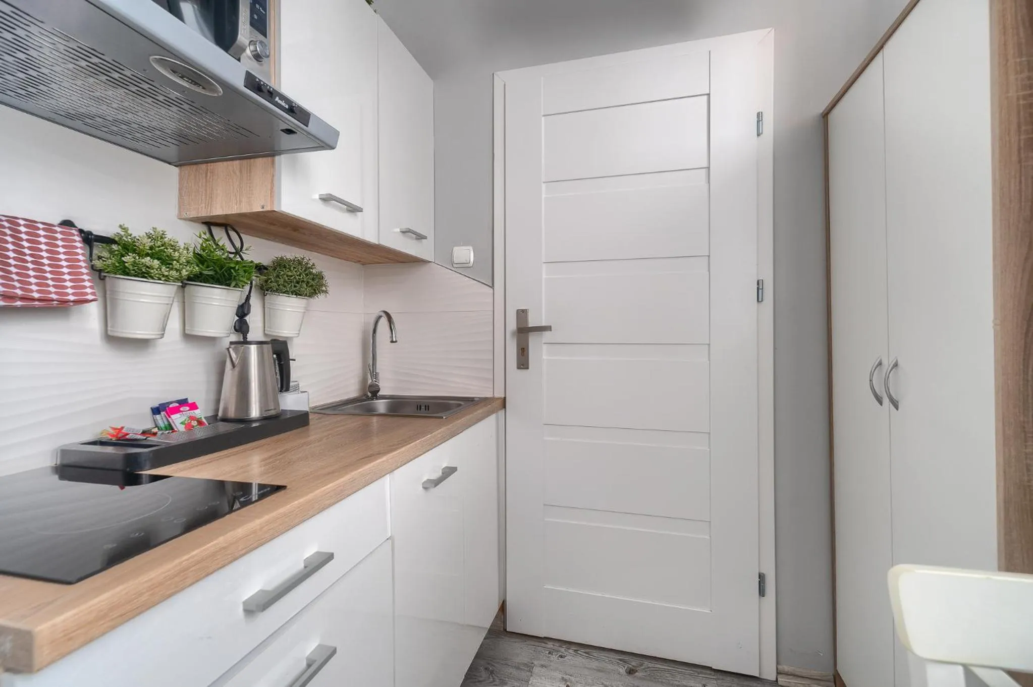 Kitchen or kitchenette in Stawa Villa & Apart