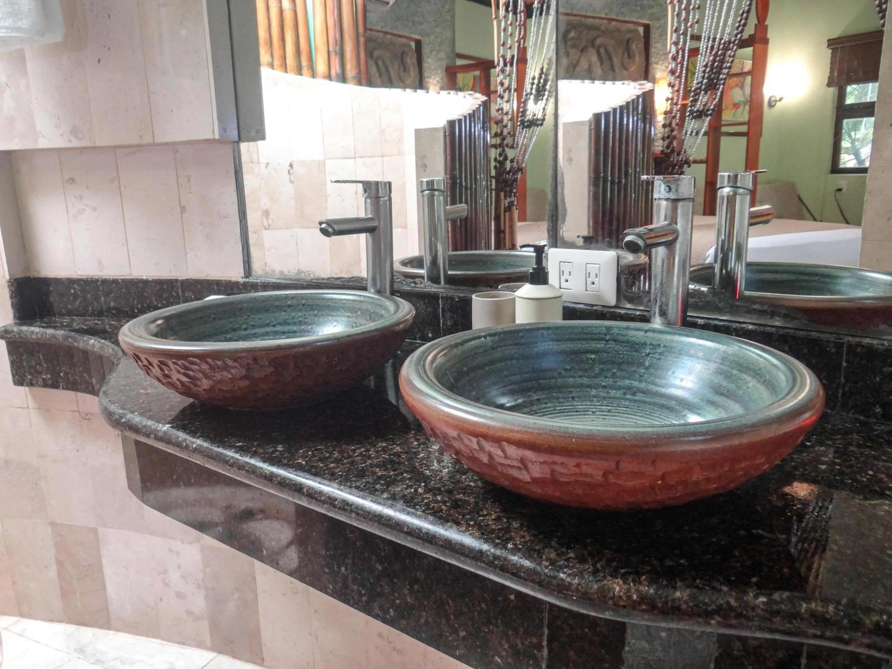 Bathroom in Cocos Cabañas Playa del Carmen Adults Only