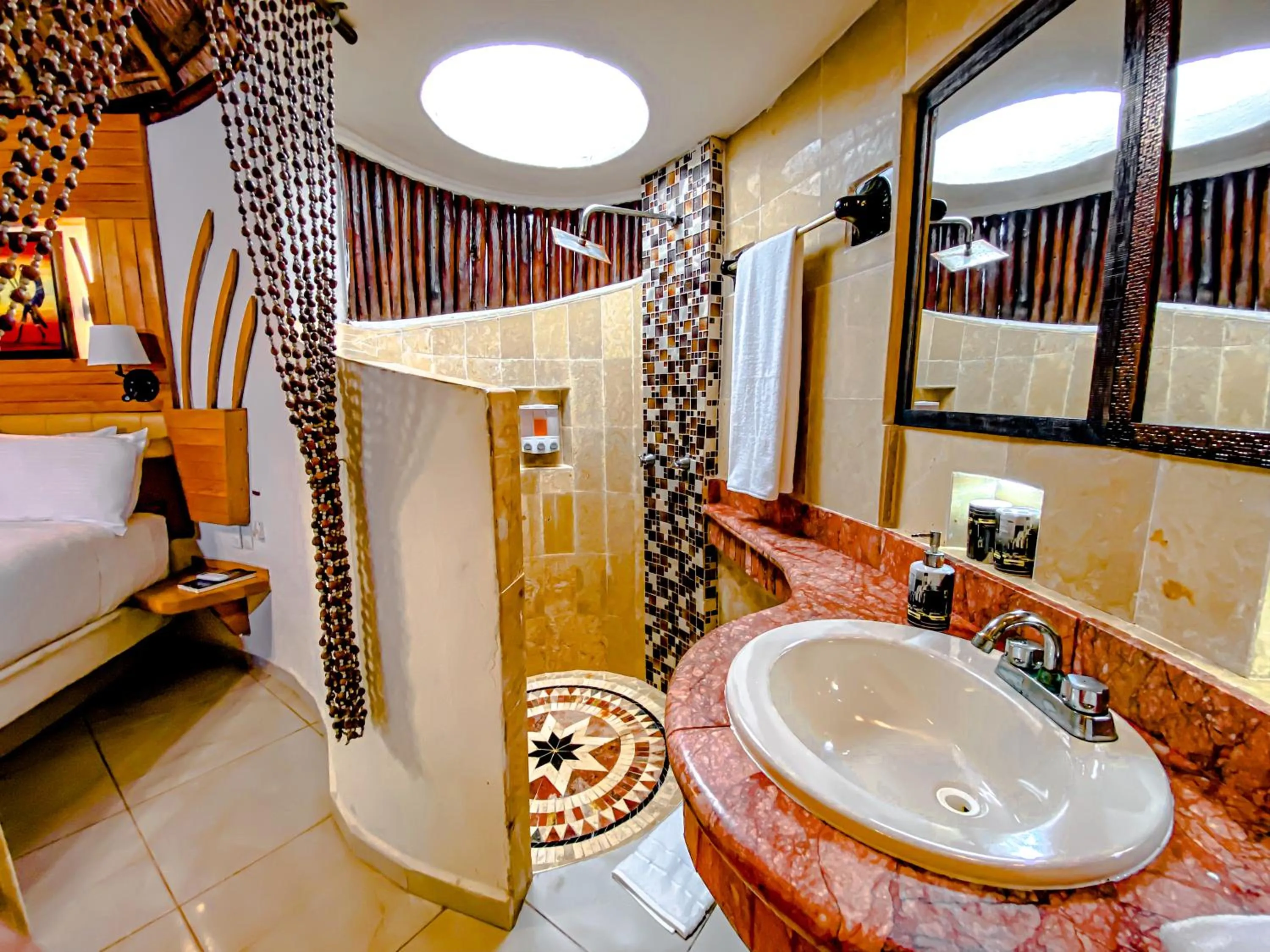 Bathroom in Cocos Cabañas Playa del Carmen Adults Only