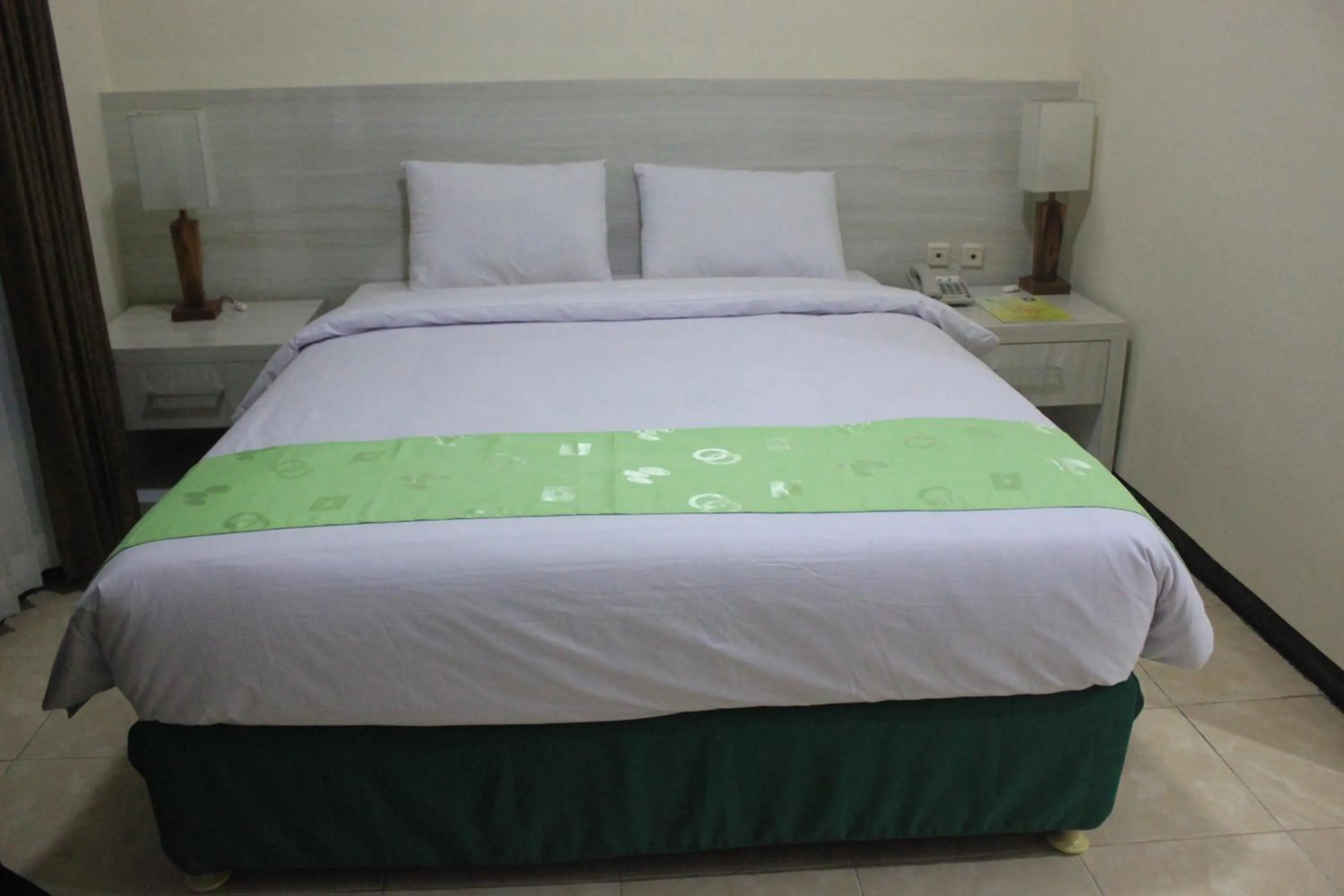 Bed in Green Garden Hotel