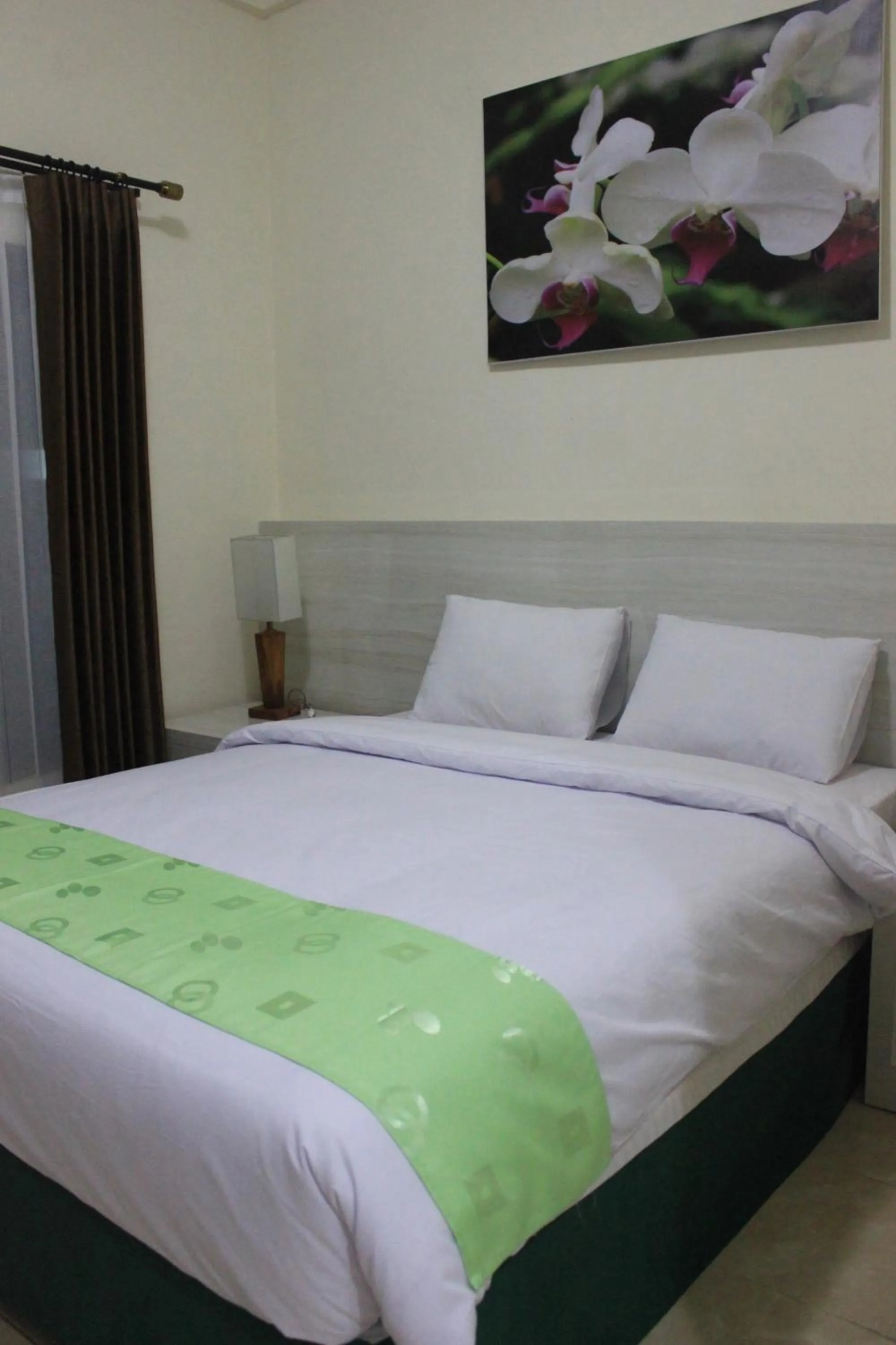 Bed in Green Garden Hotel