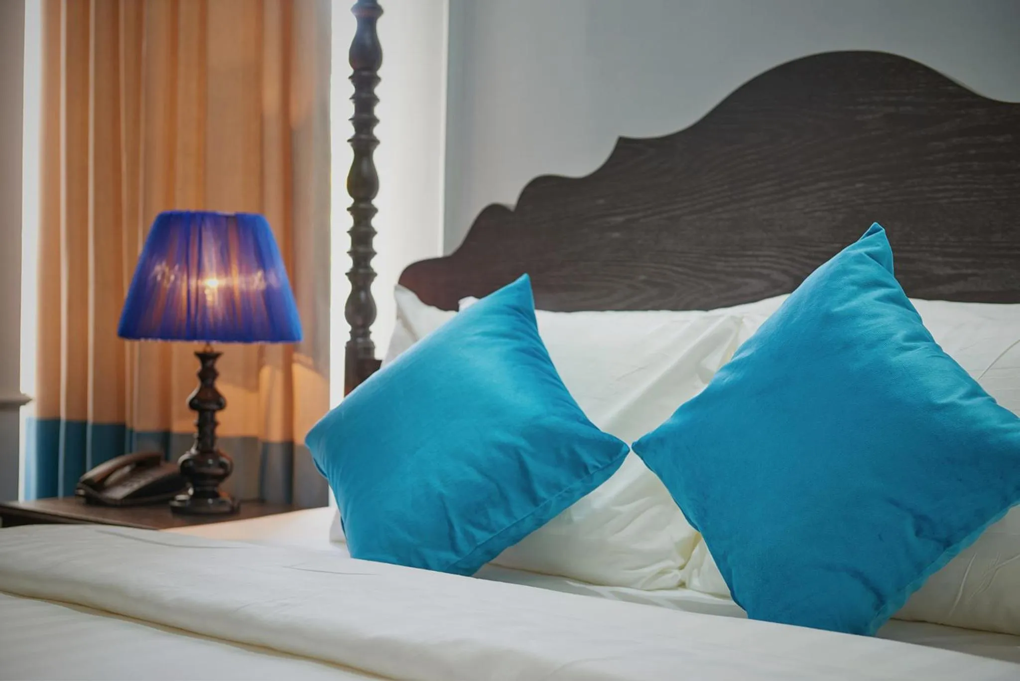 Bed in Manoir Des Arts Hotel