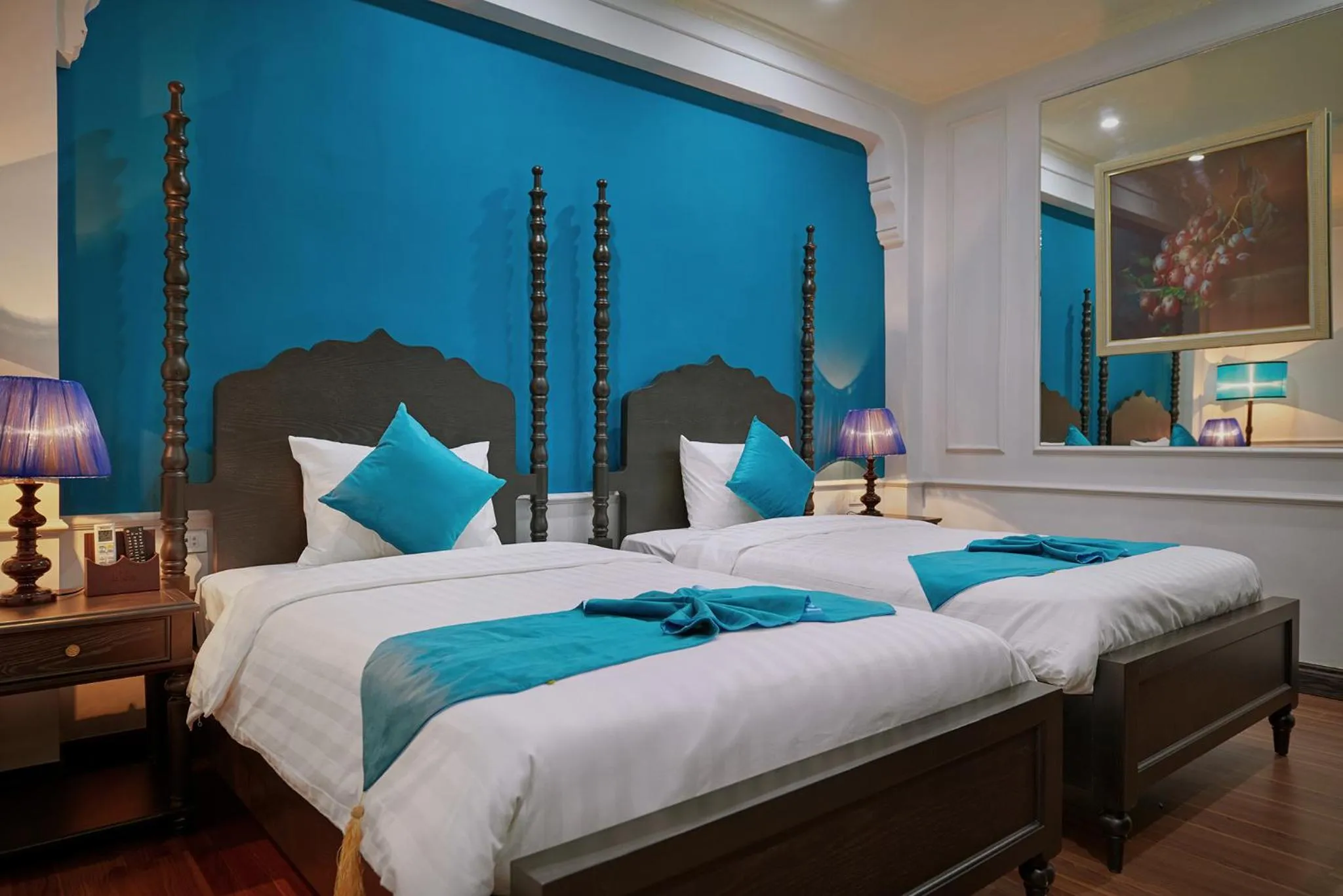 Bed in Manoir Des Arts Hotel