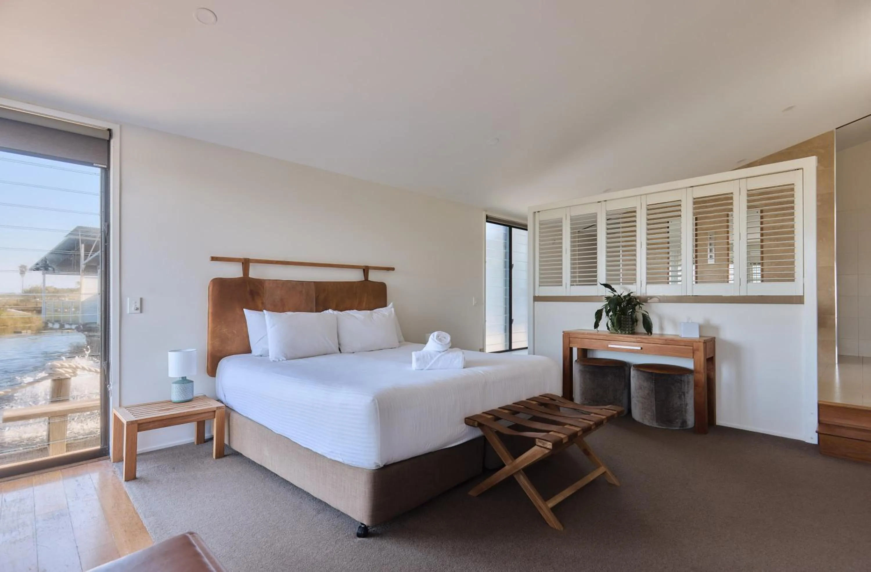 Bed in Caves Coastal Bar & Bungalows