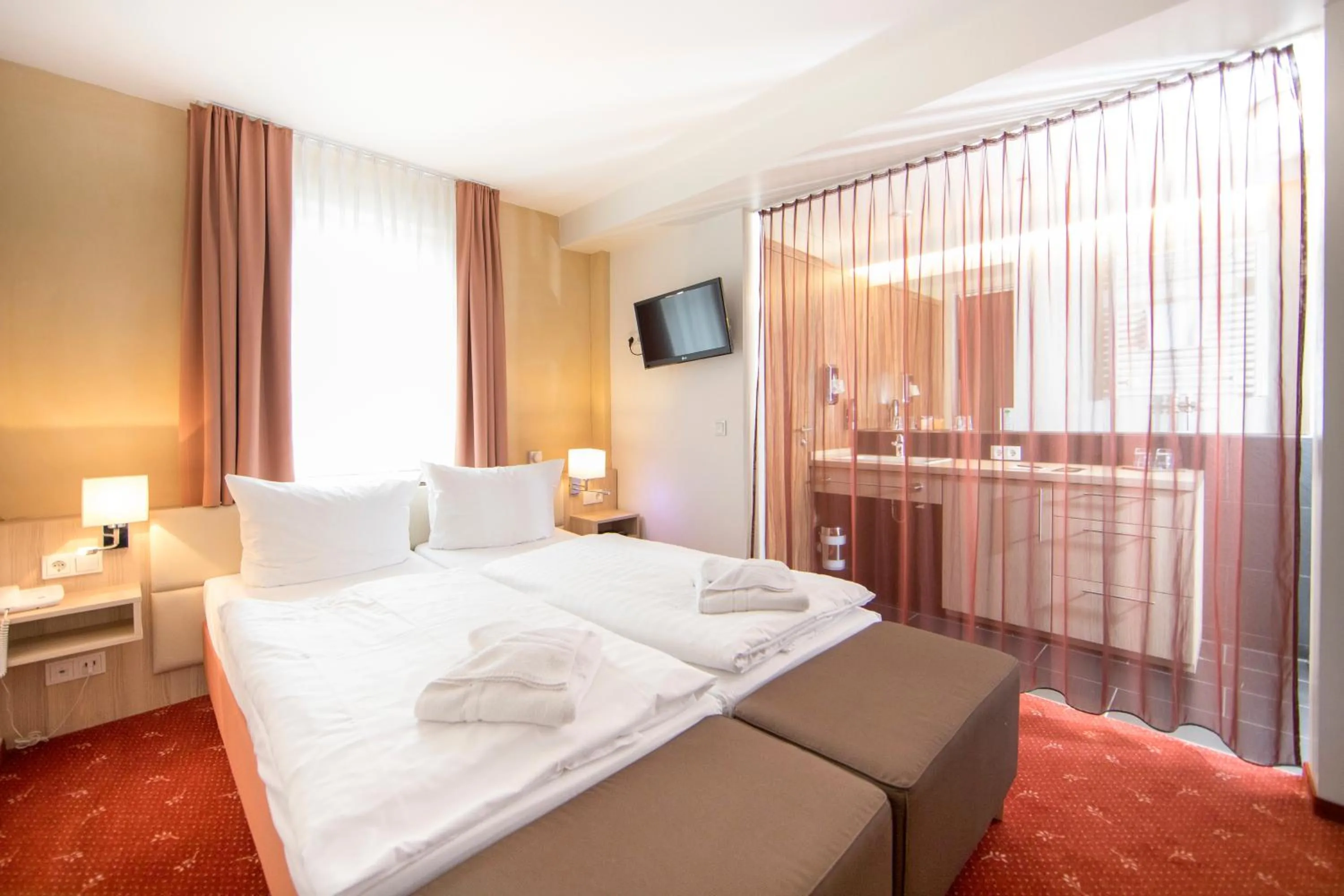 Bed in Hotel Saxenhof