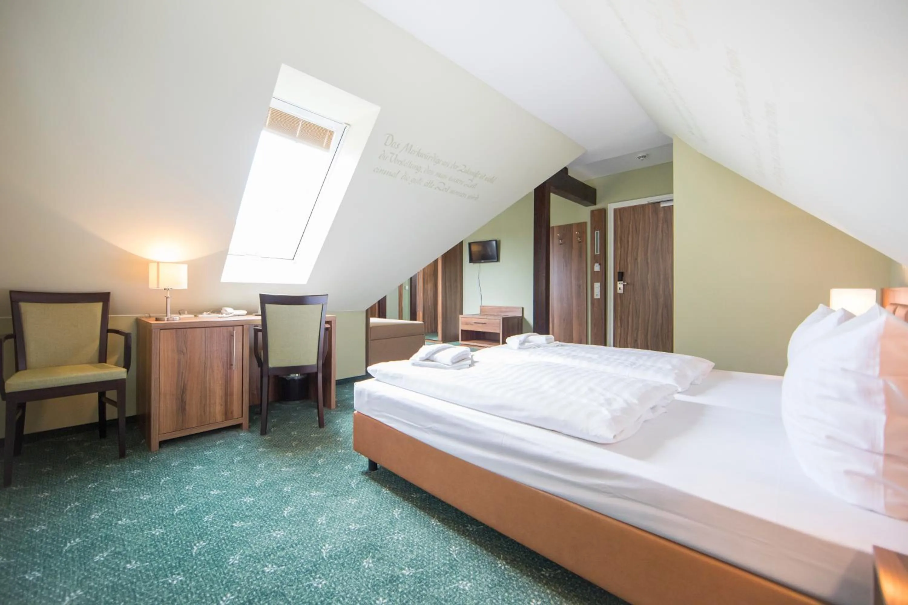 Bed in Hotel Saxenhof