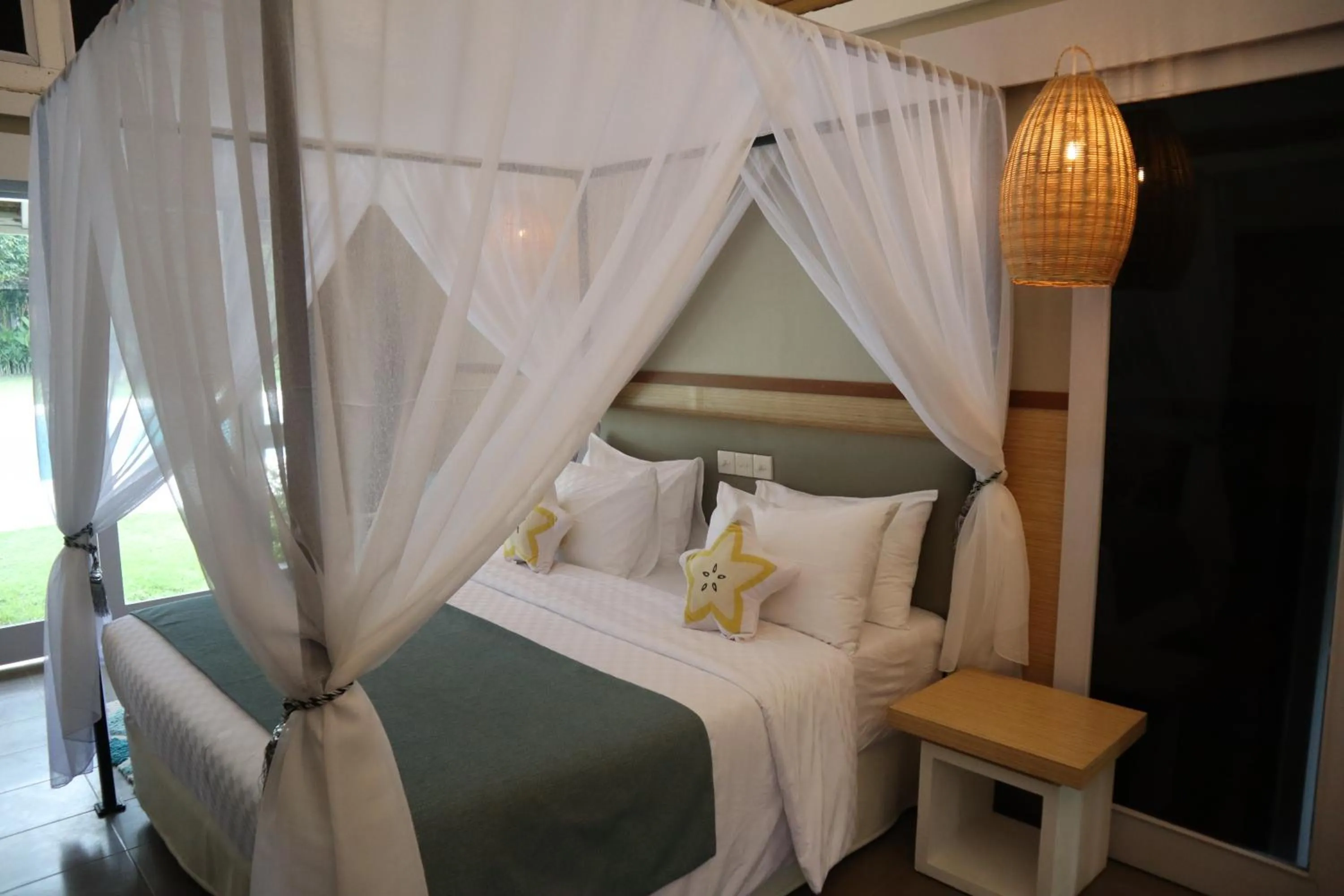 Bed in The Forty Eight Resort Candidasa