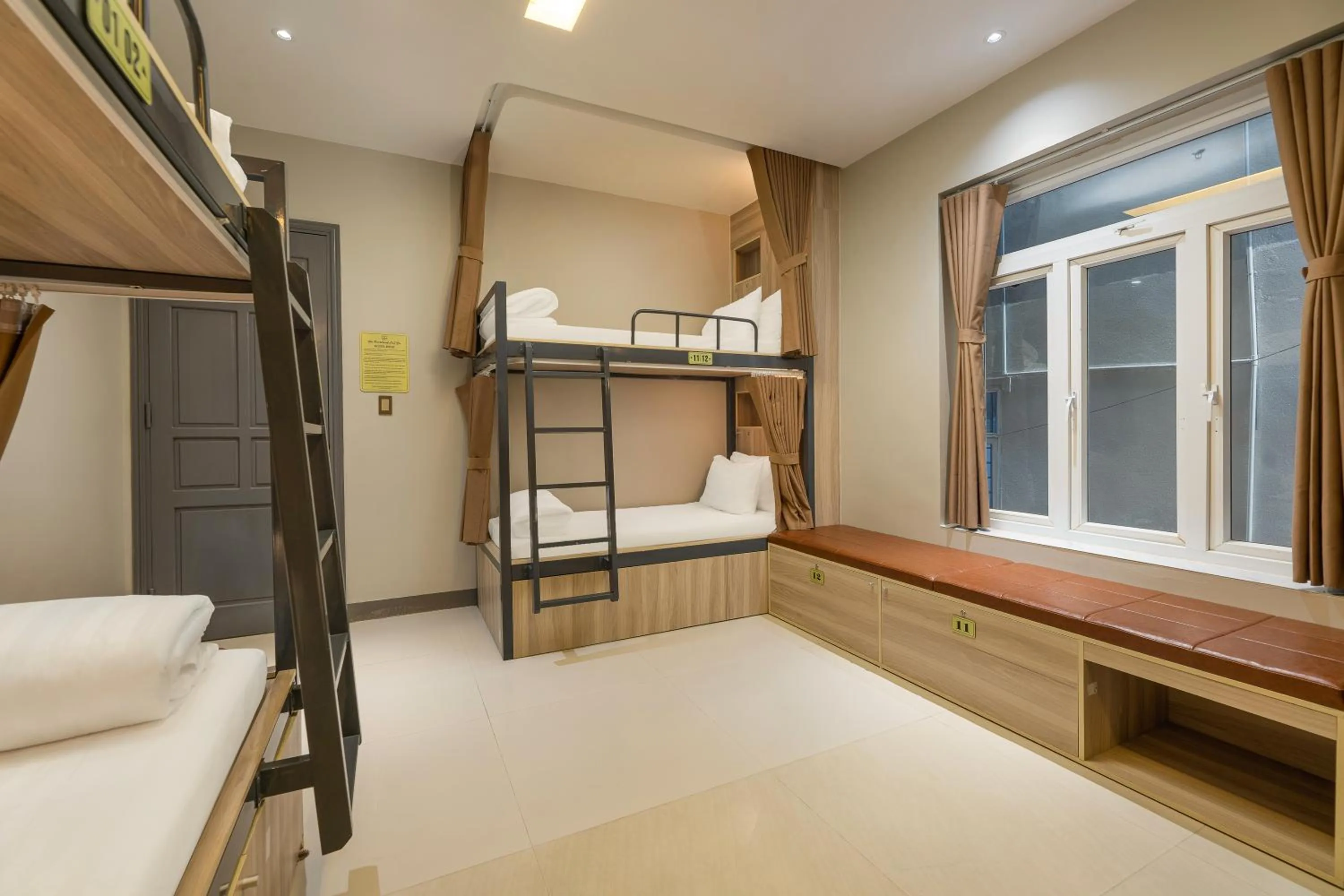 Property building, Bed in The Oversleep Catba Hostel & Pool Bar