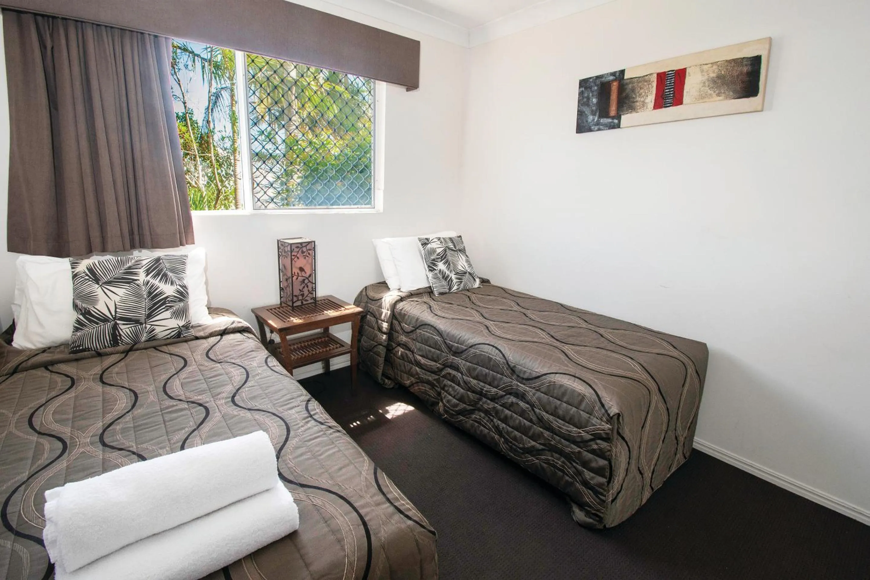 Bed in Grande Florida Beachside Resort