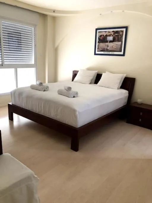 Bed in Nitza Seaview Apartments