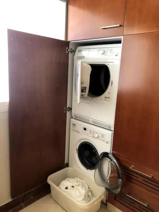 washing machine in Nitza Seaview Apartments