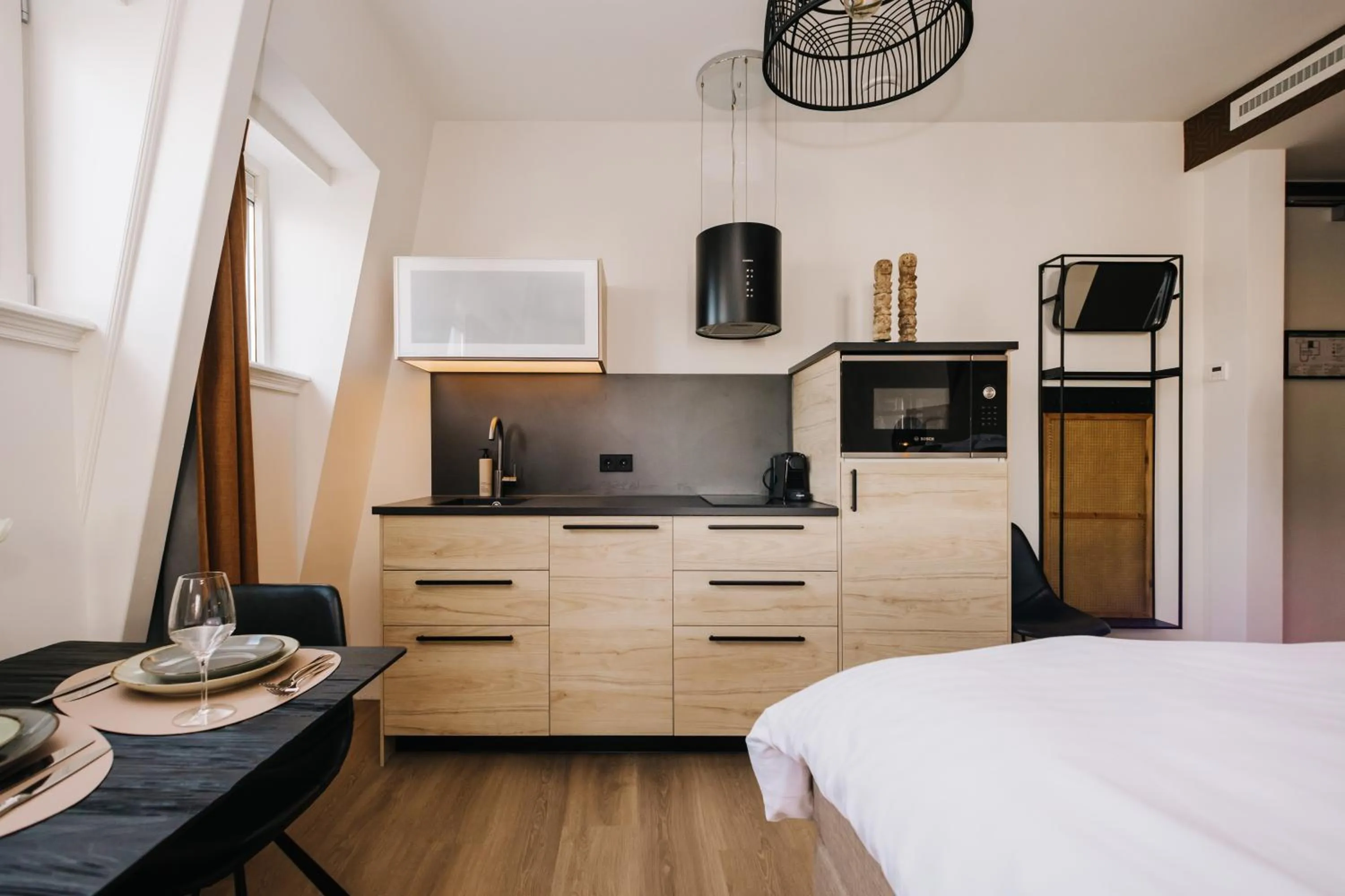 Kitchen or kitchenette, Bed in Boutique hotel Margretha