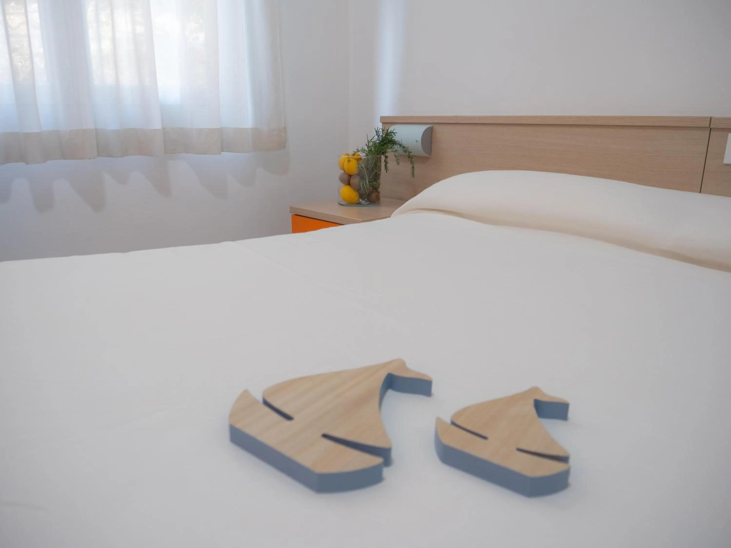 Bed in Hotel Liliana