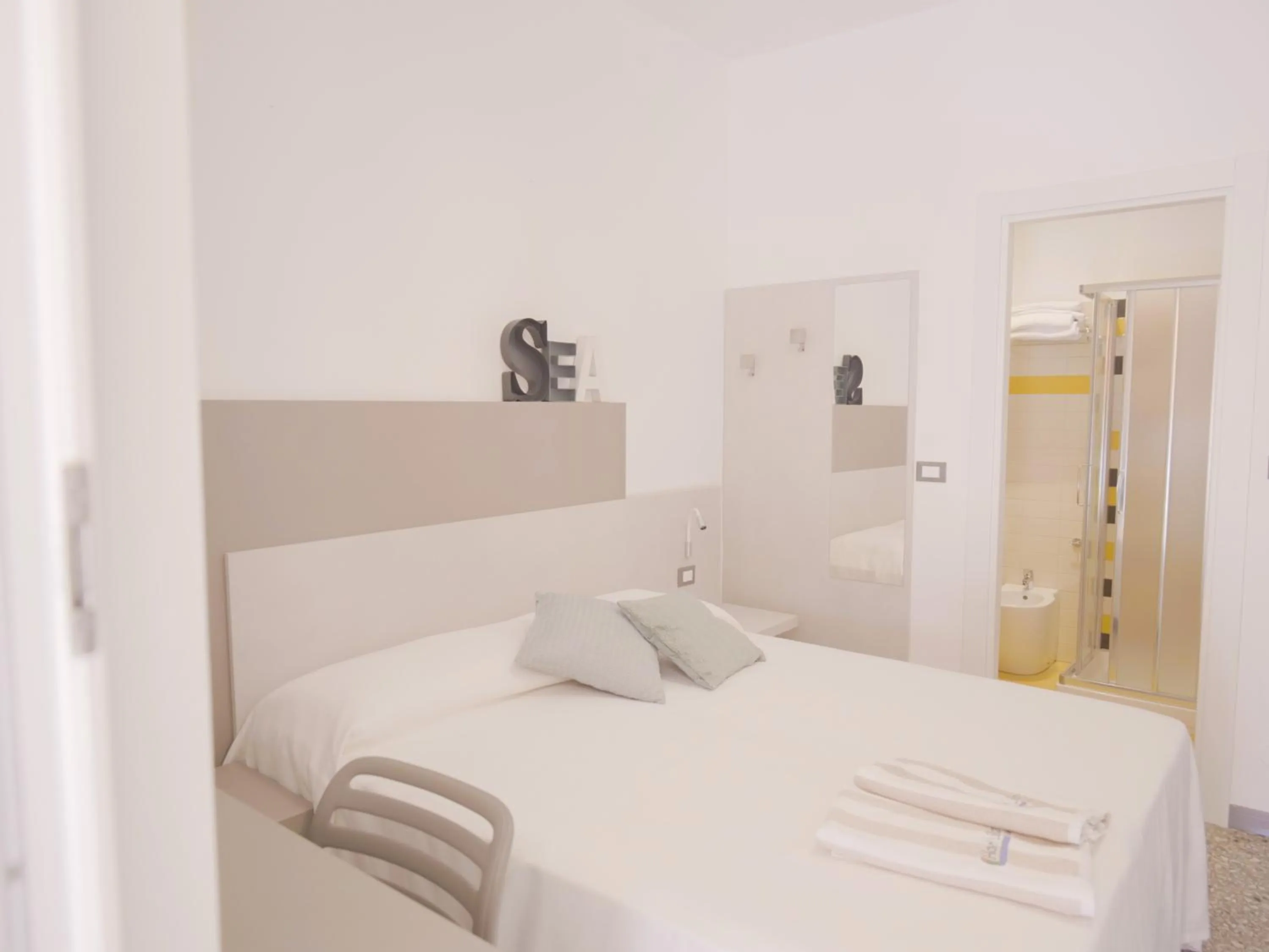 Bed in Hotel Liliana