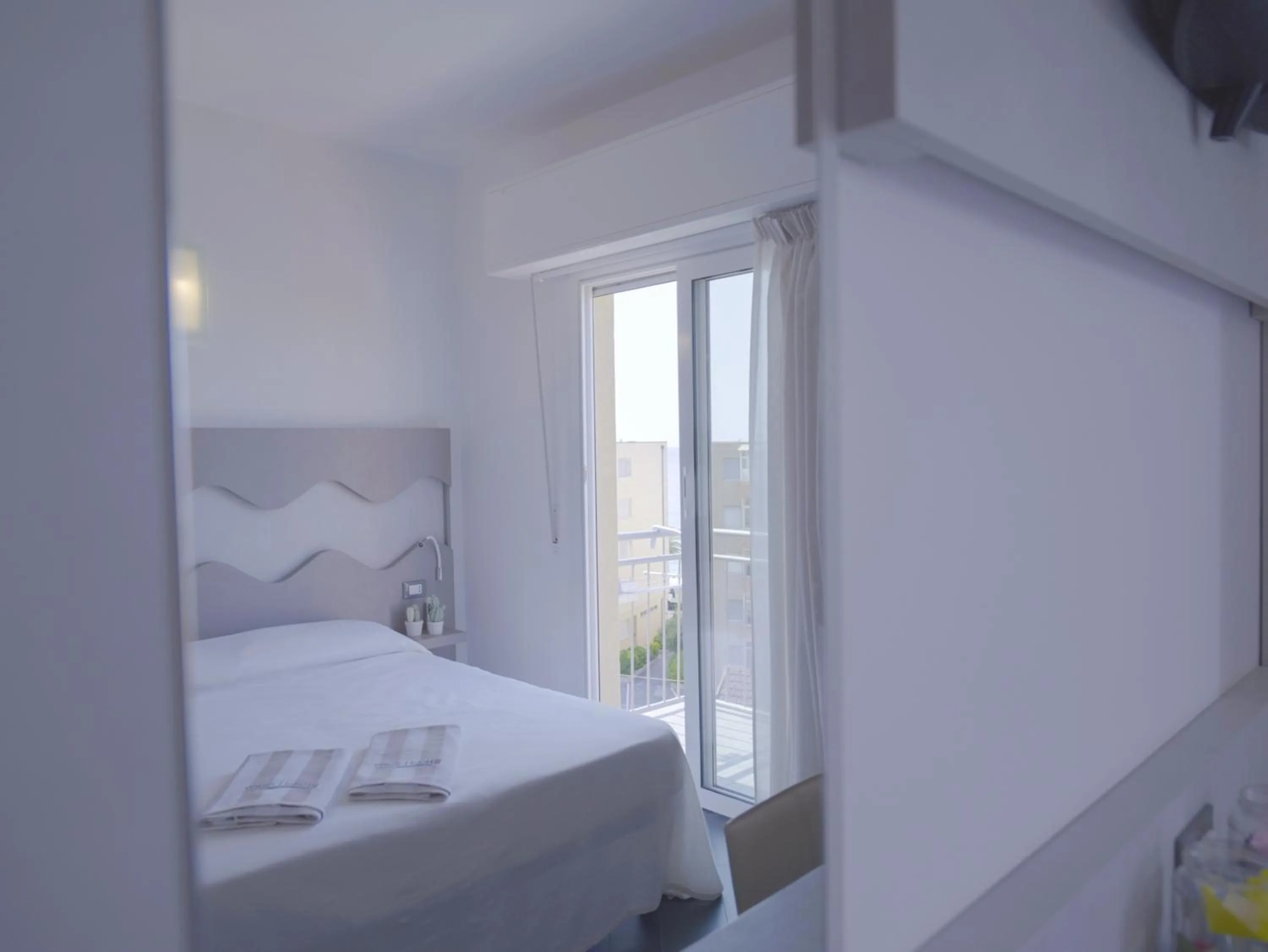 Bed in Hotel Liliana