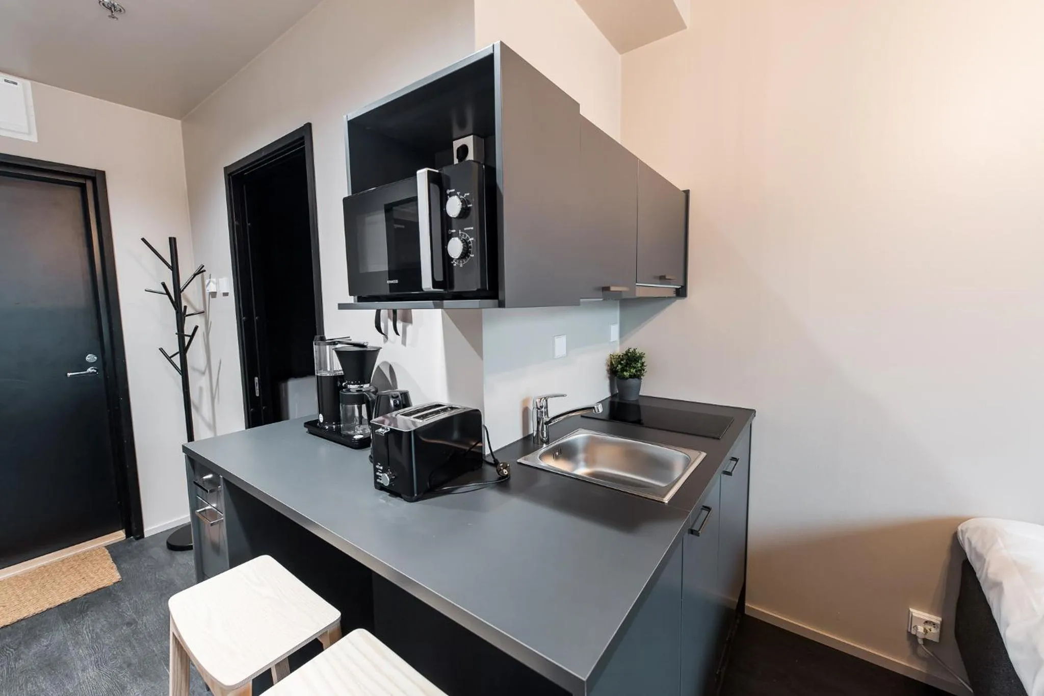 Kitchen or kitchenette in Forenom Aparthotel Vantaa Tikkurila