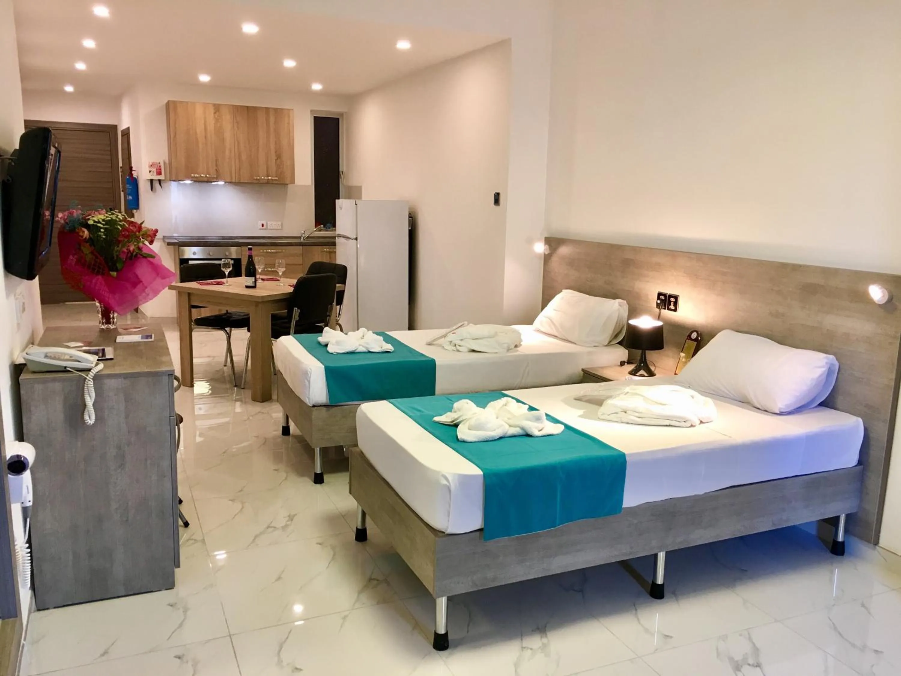 Bed in For Rest Aparthotel