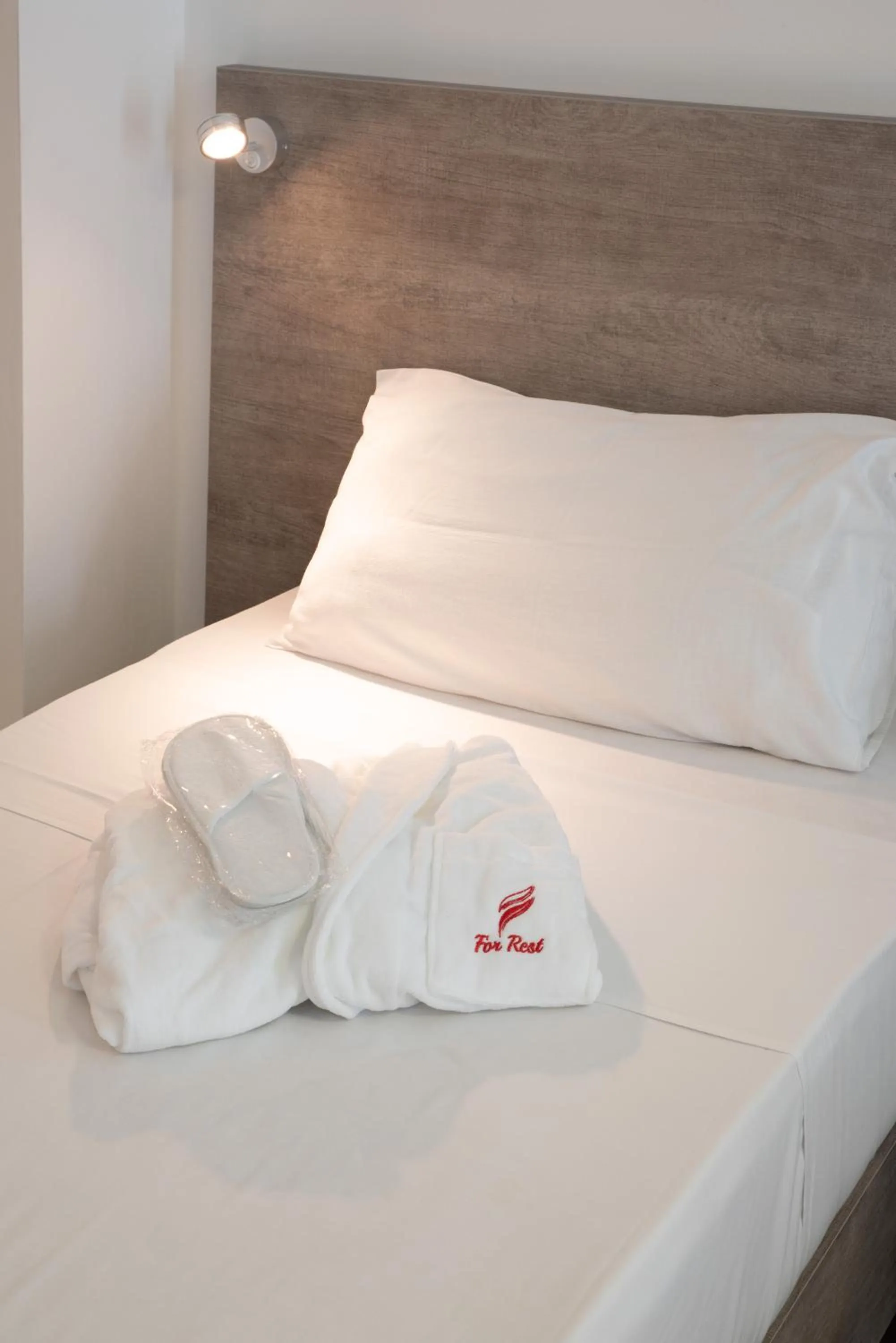 Bed in For Rest Aparthotel