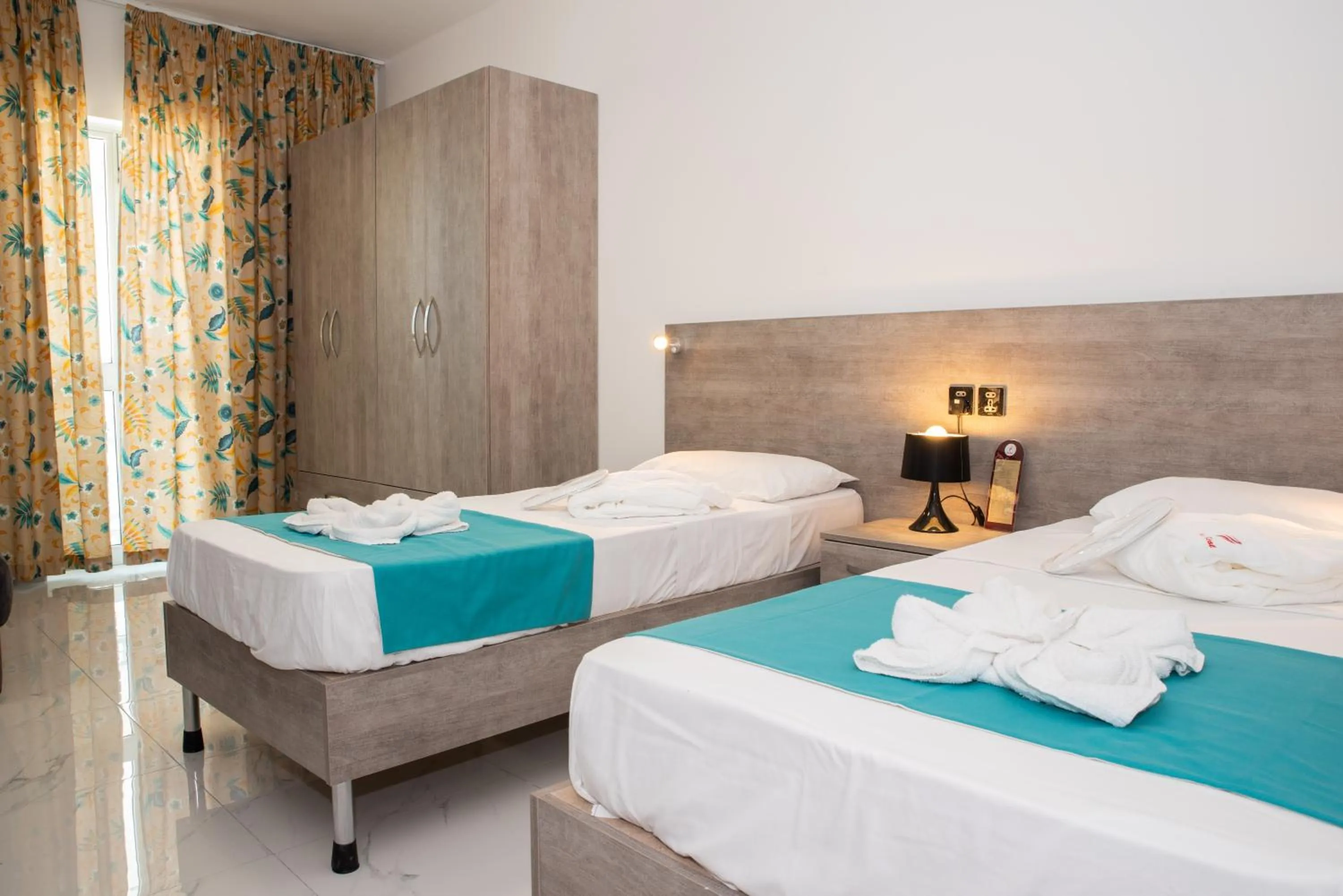 Bed in For Rest Aparthotel