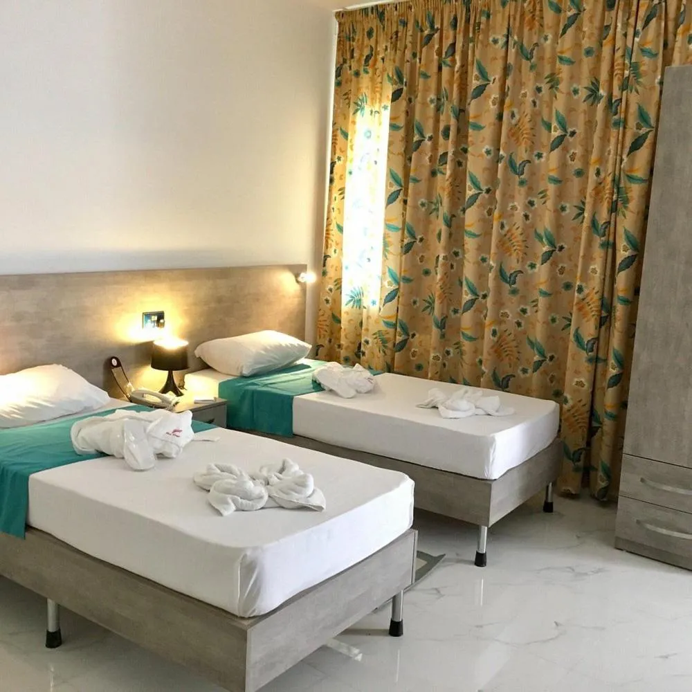 Bed in For Rest Aparthotel