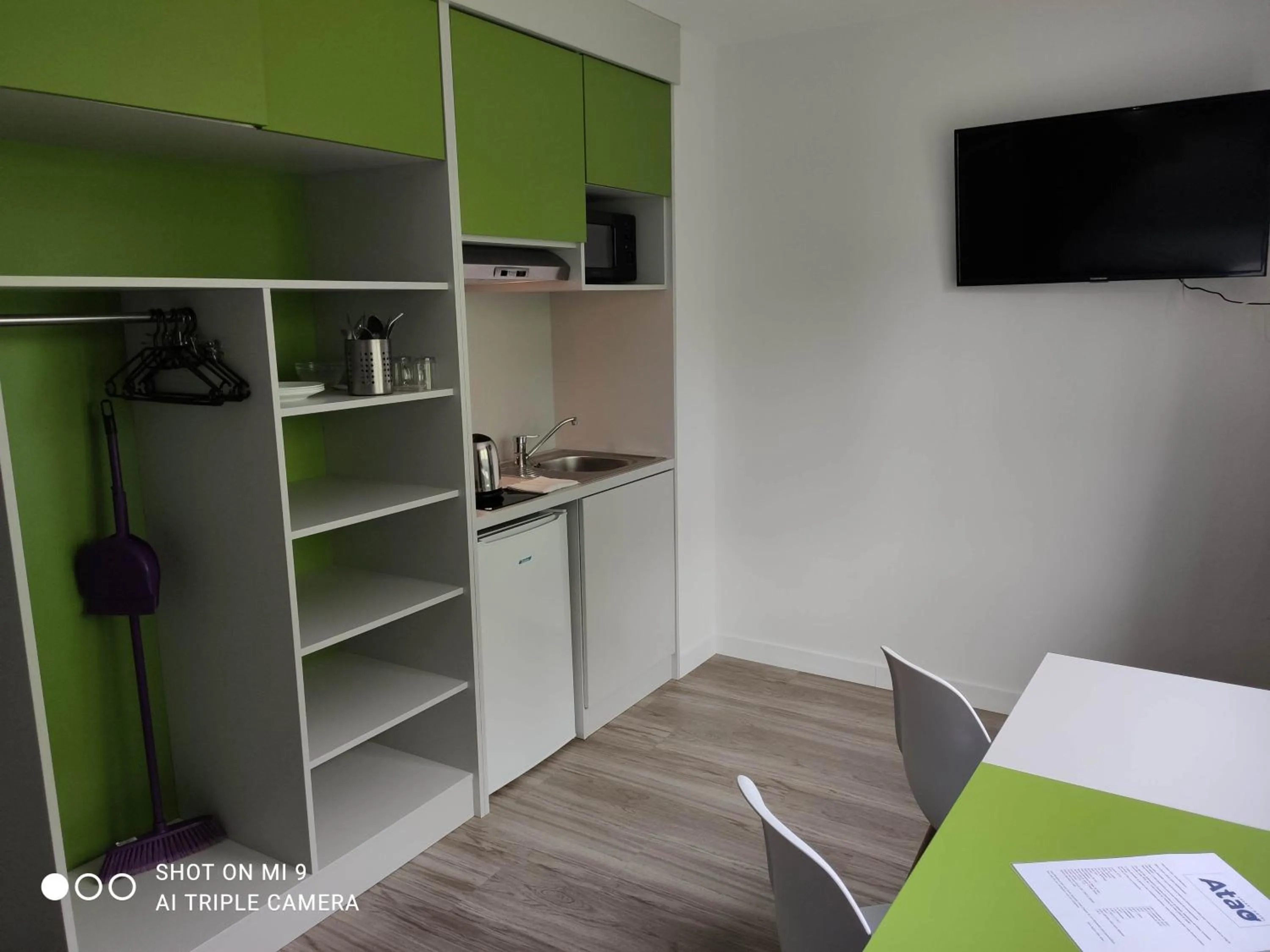 Kitchen or kitchenette, Bed in Atao Residence- Rennes Sud