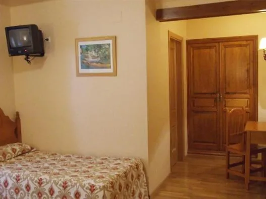 Photo of the whole room, Bed in Hotel Turrull