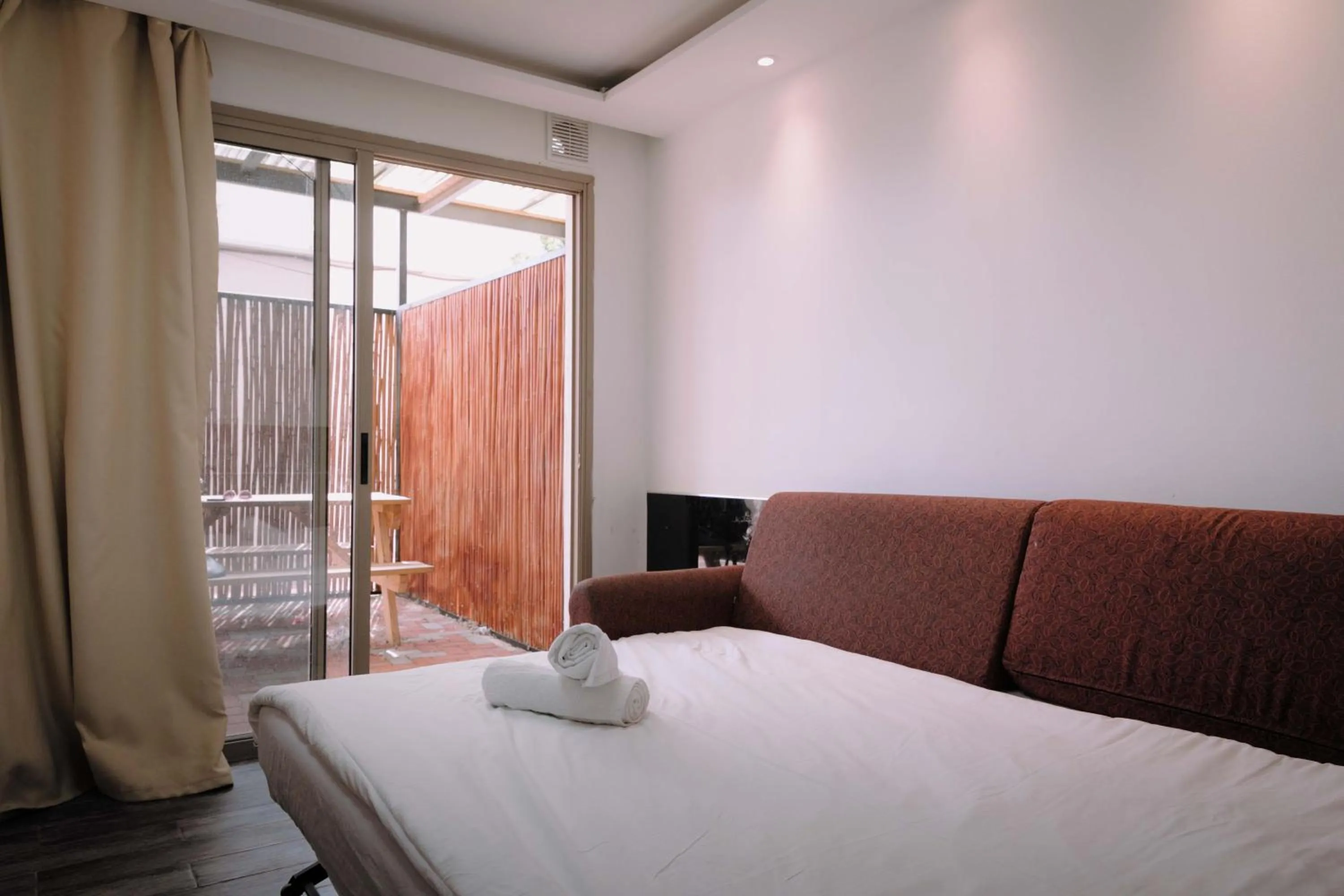 Bed in Rich Luxury Suites