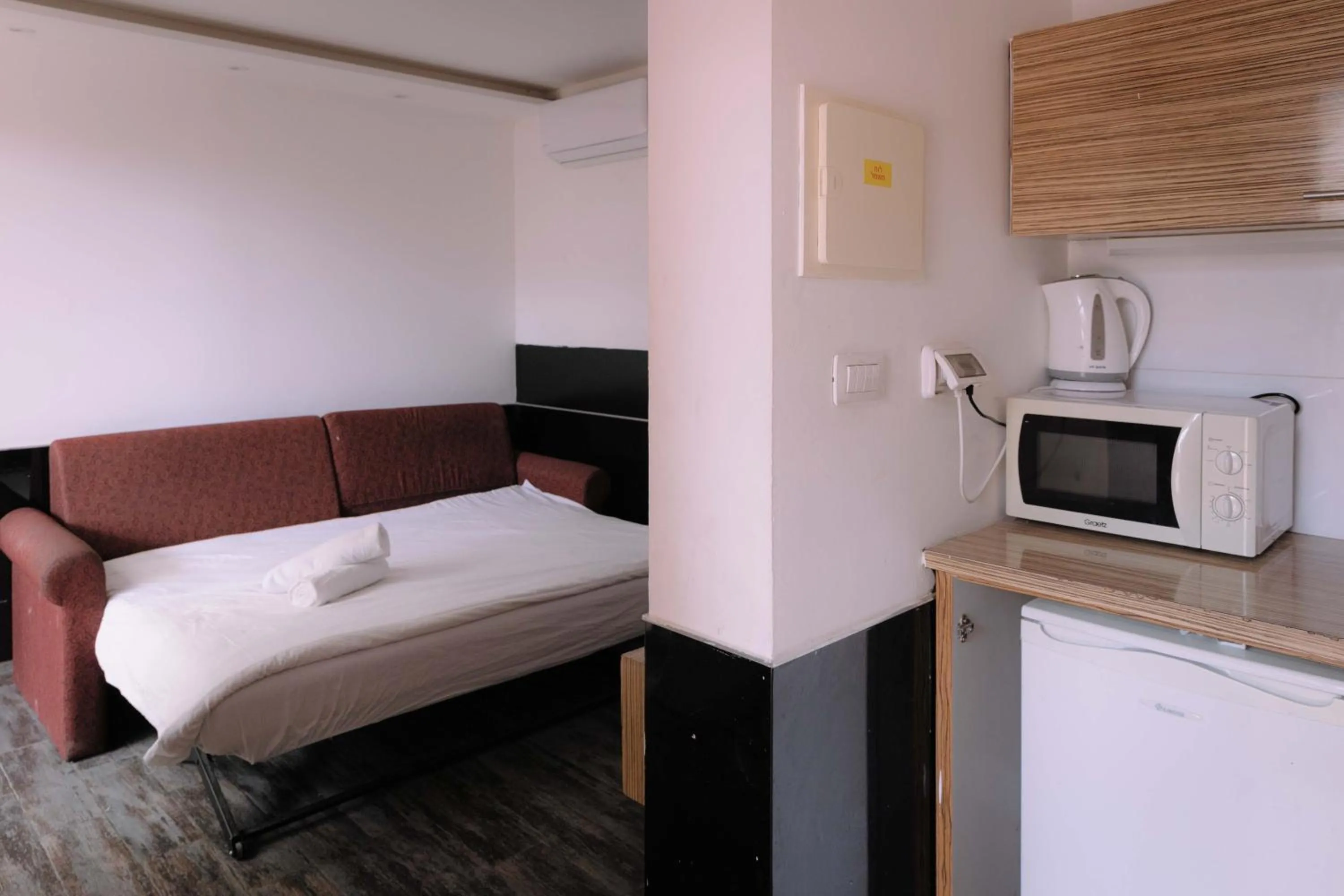 Bed in Rich Luxury Suites