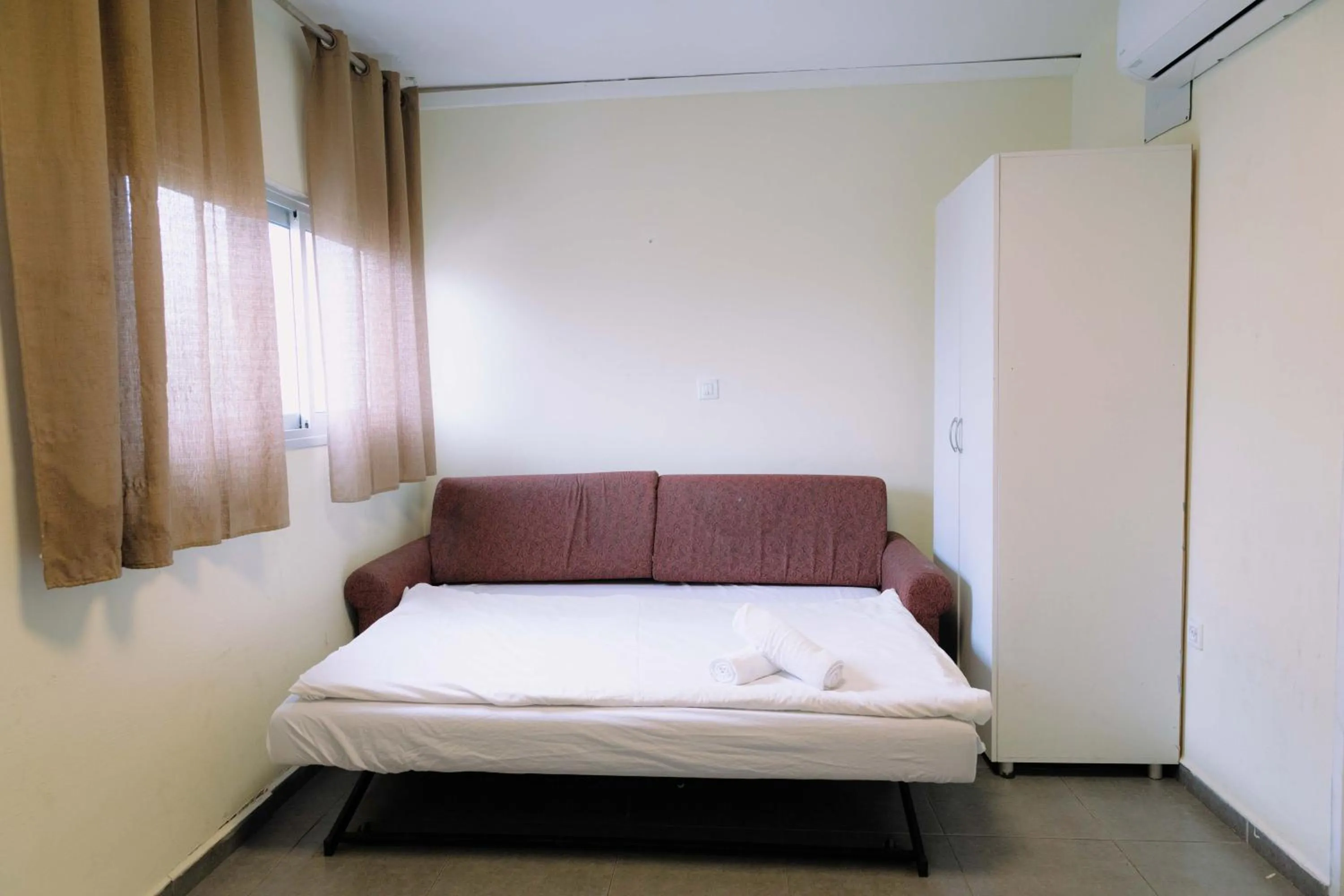 Bed in Rich Luxury Suites