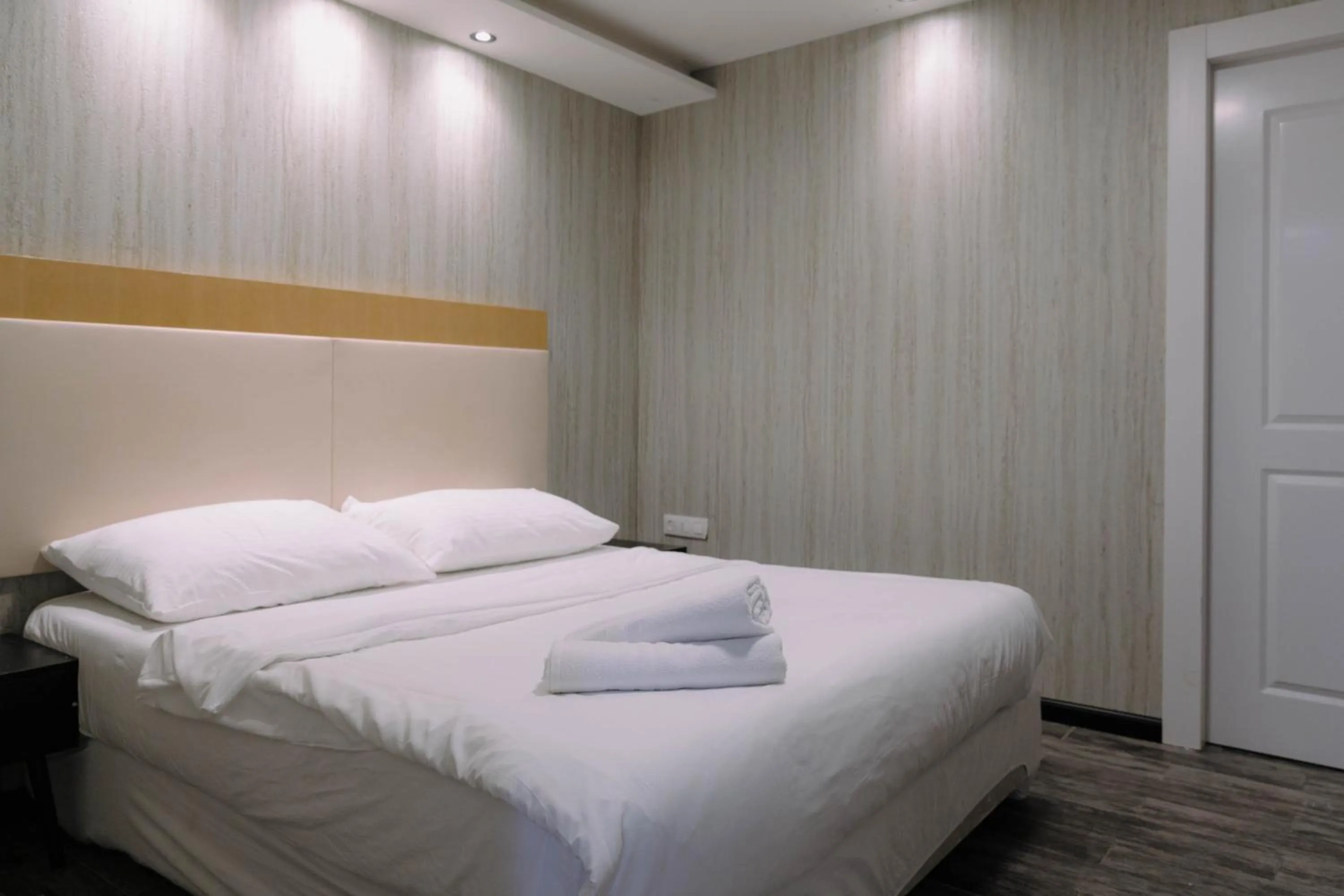 Bedroom in Rich Luxury Suites - Renovated