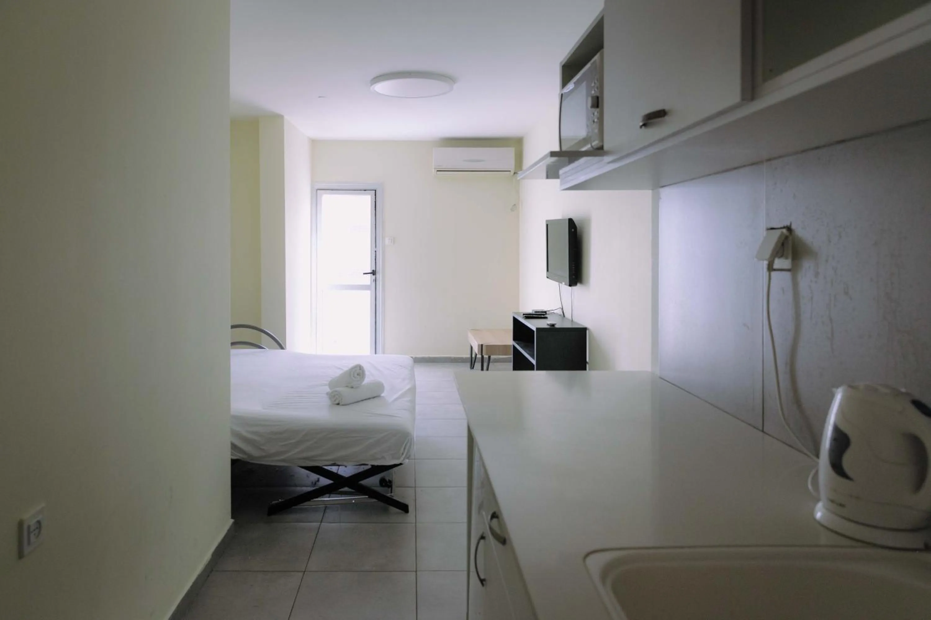 Bed in Rich Luxury Suites