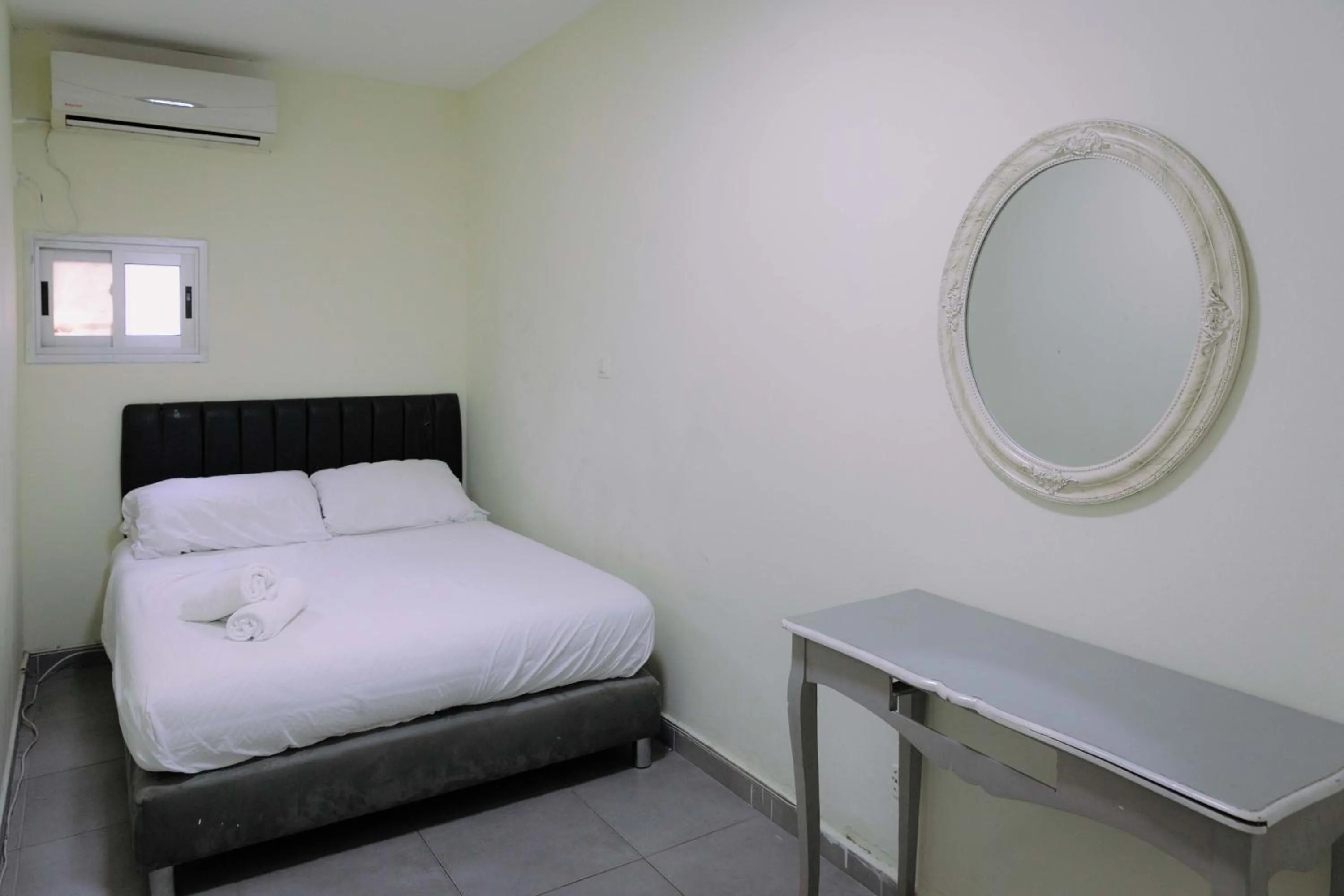 Bed in Rich Luxury Suites